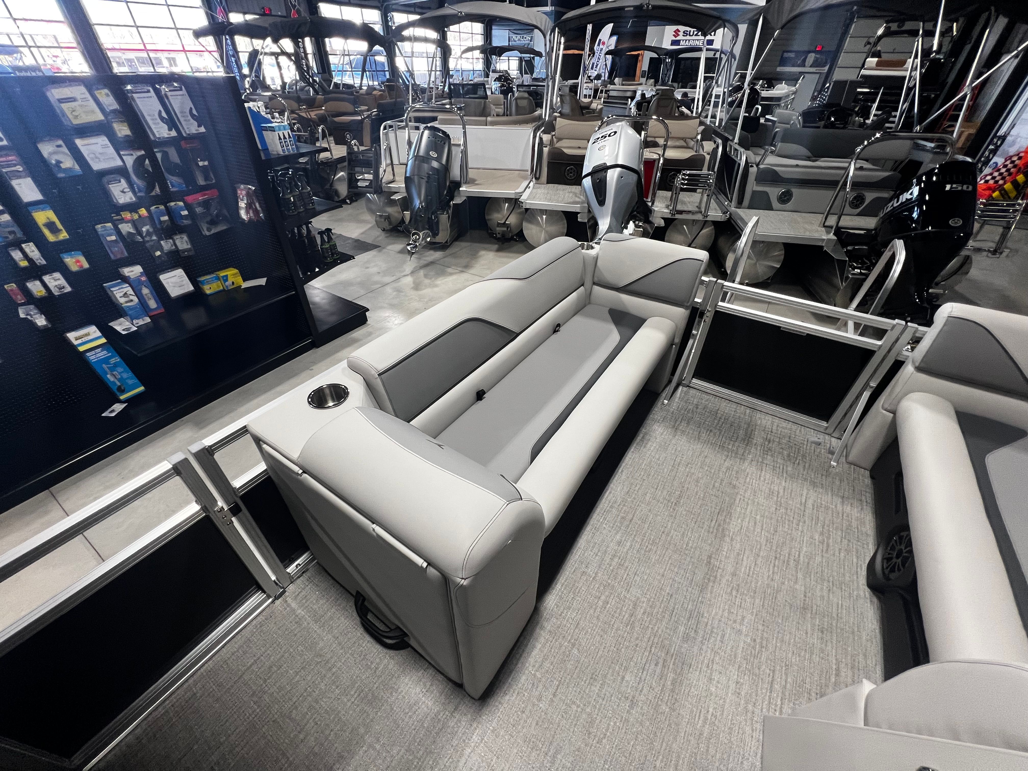 2026 Tahoe 2180 Sport Quad Lounger in showroom.