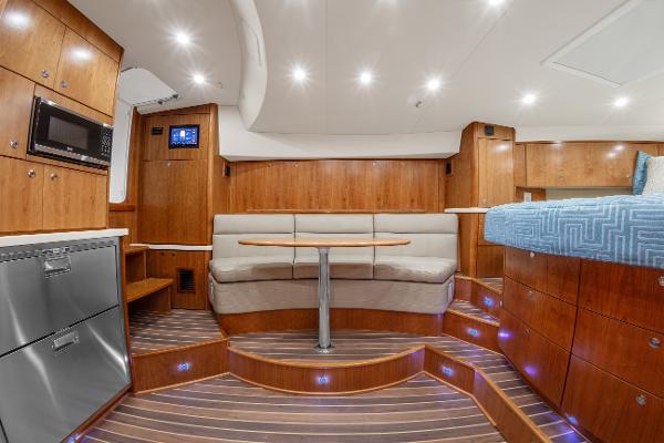 Luxurious interior of 2025 Albemarle 36 Express yacht with modern amenities and elegant wood finishes.