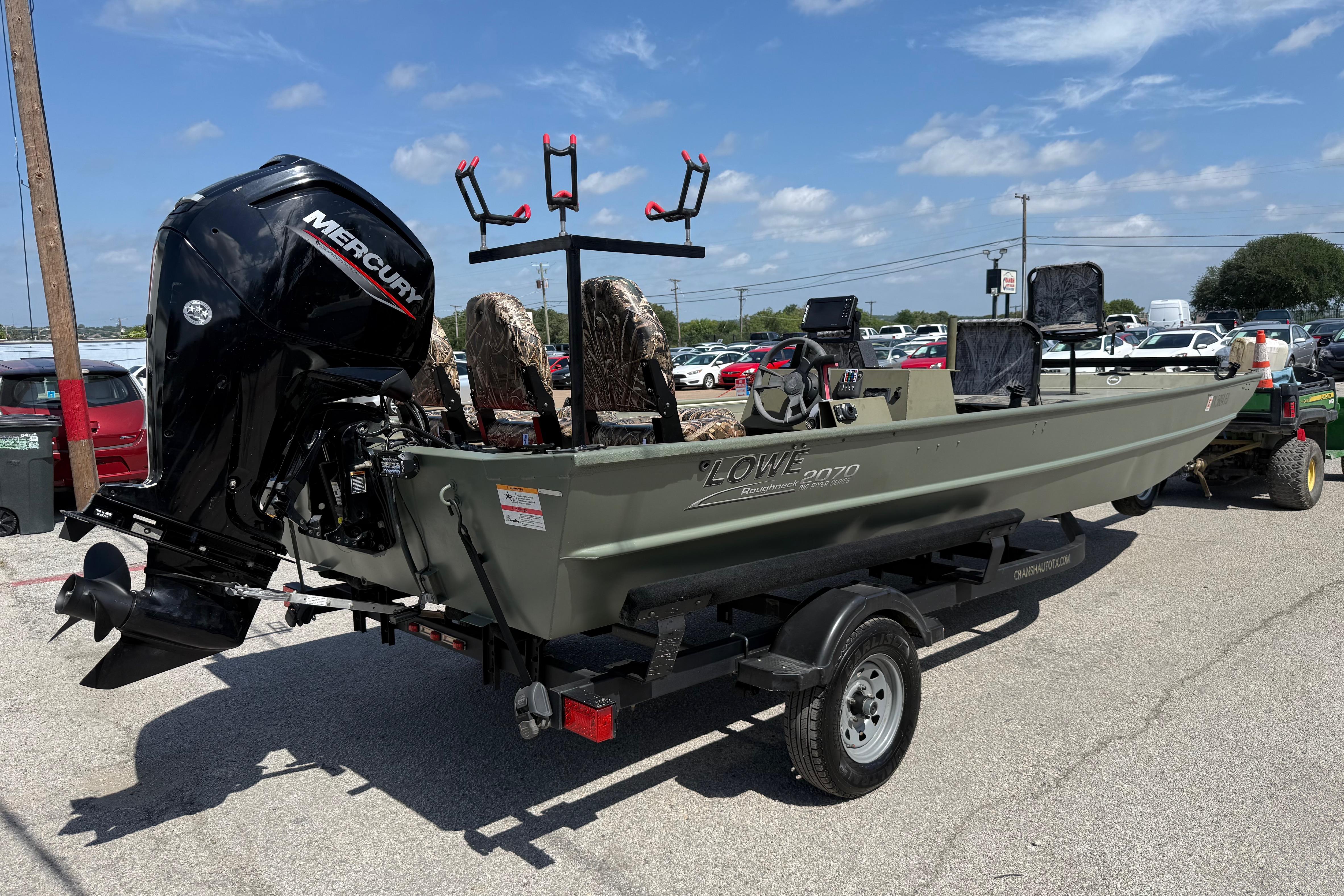 Lowe Roughneck 2070 Big River 2020 on a trailer with an outboard motor.