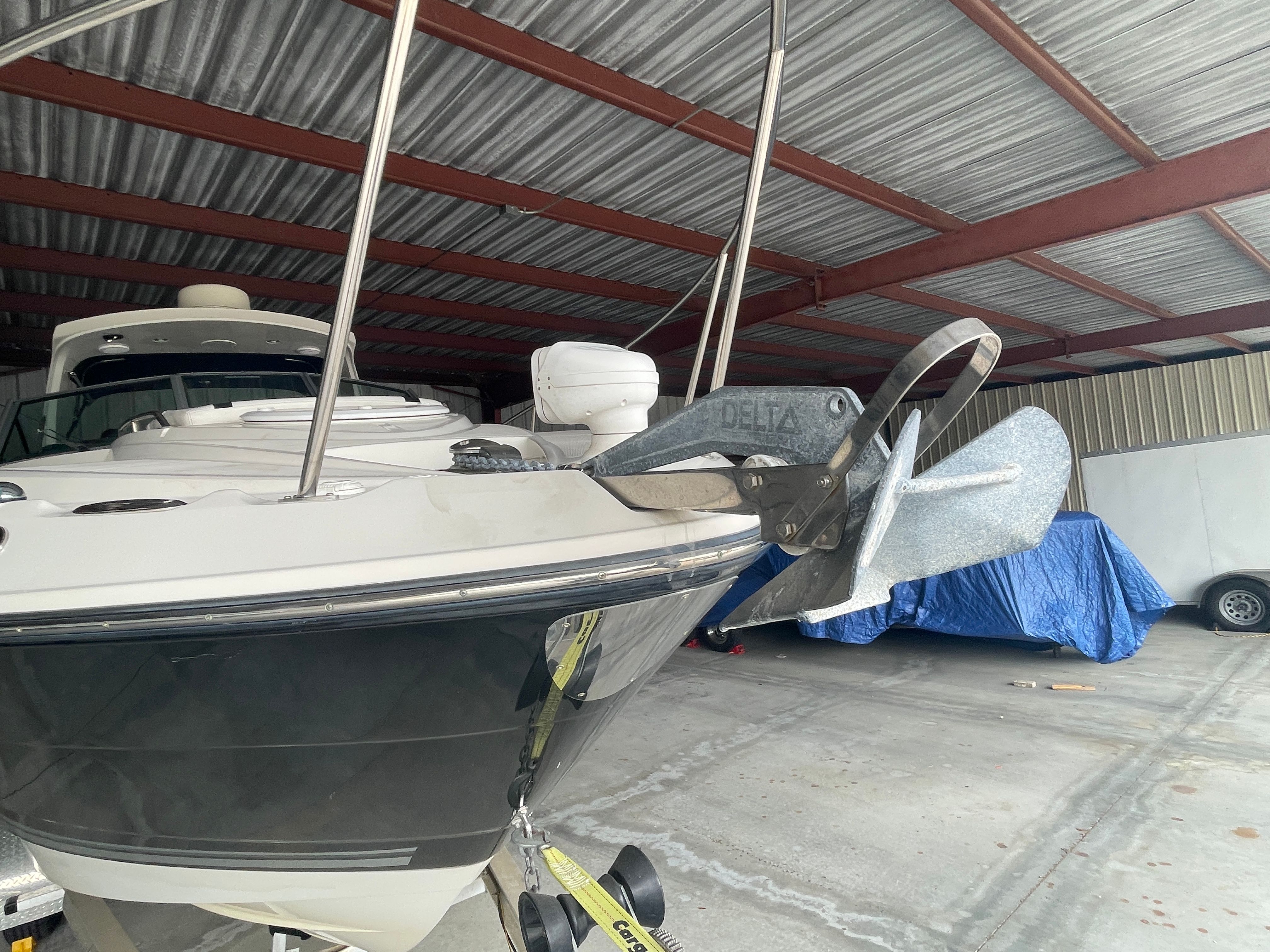 Monterey 280 Sport Cruiser 2010 in storage with anchor.
