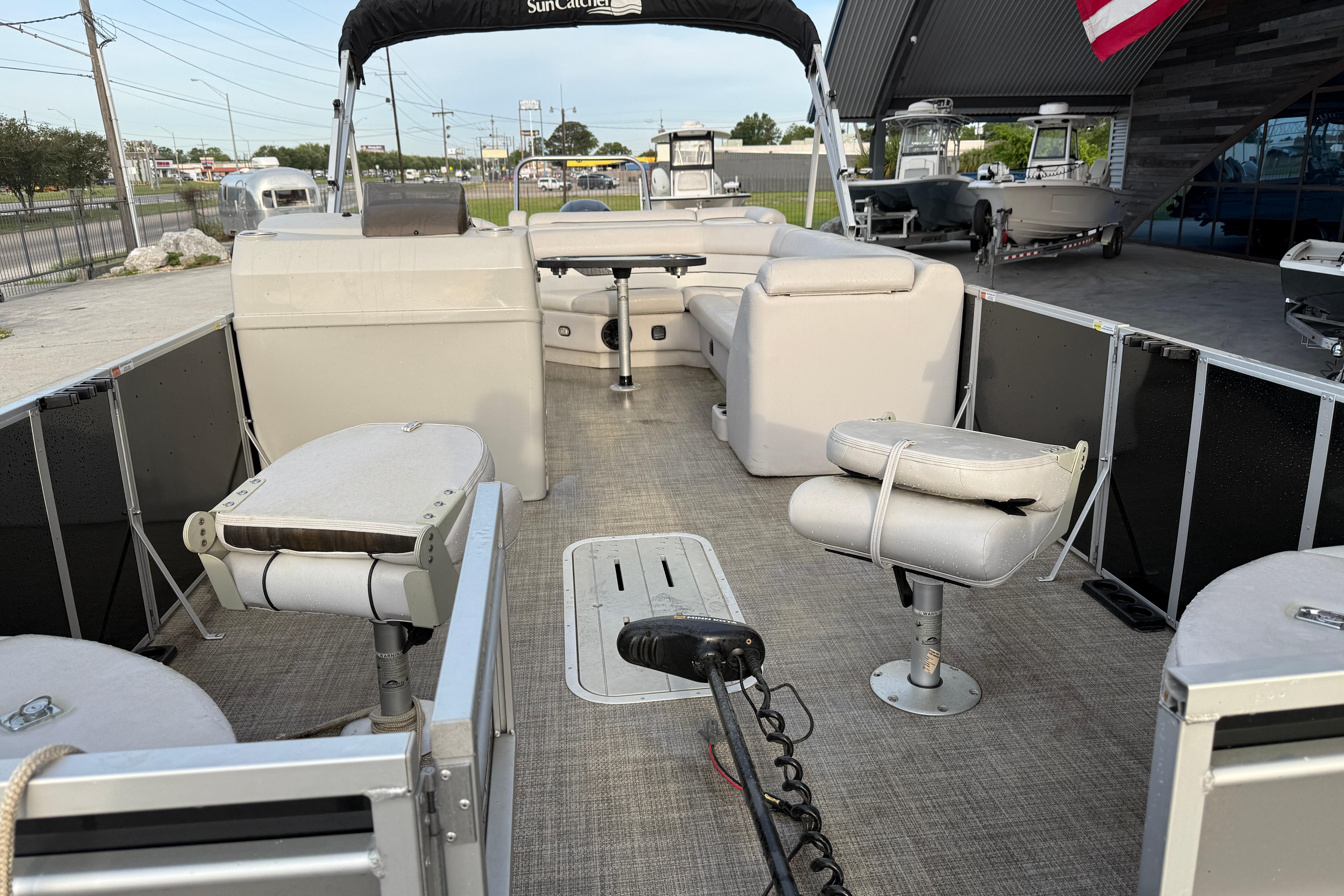 2022 Custom G3 Suncatcher 322FC pontoon boat interior with seating and helm.