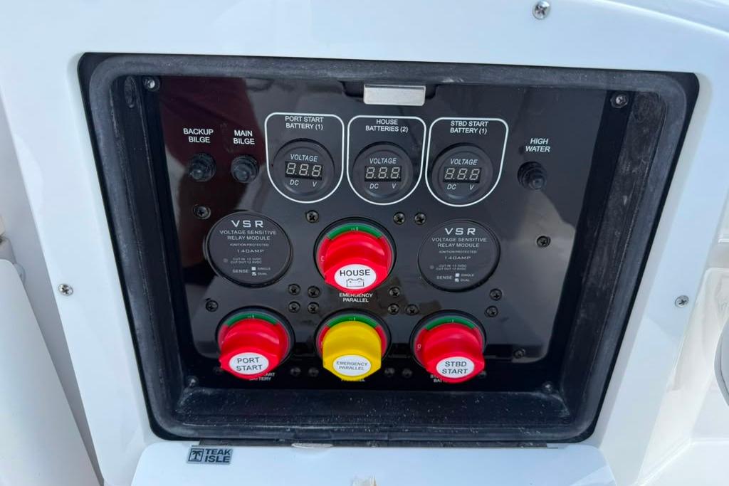 Control panel of a 2026 Sea Fox 288 Traveler boat with voltage displays and switches.