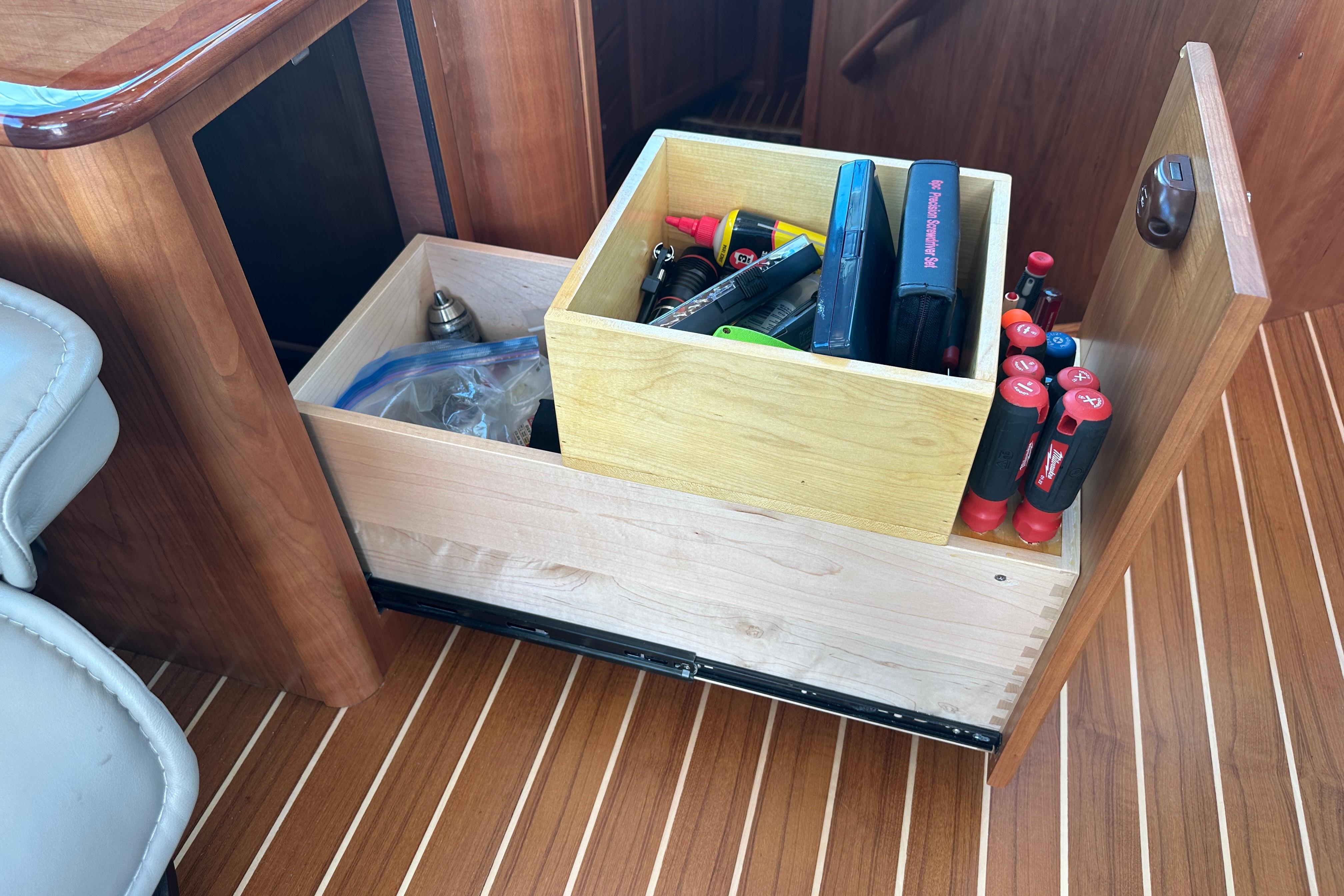 Drawer with tools and supplies on a 2025 Sabre 48 Salon Express yacht.