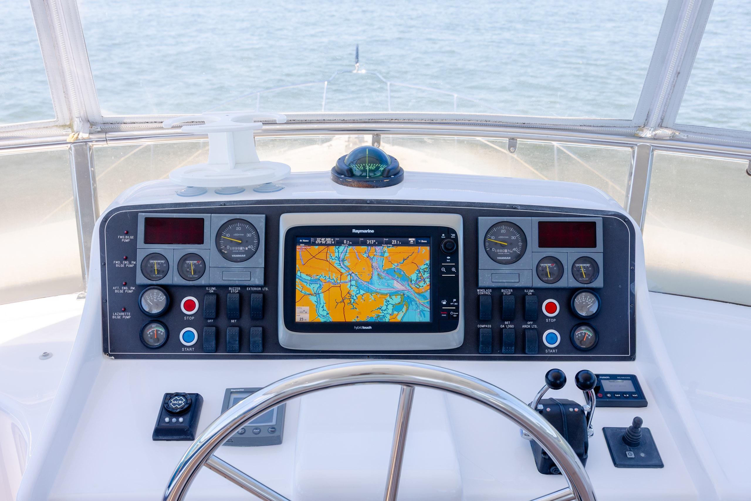 Cockpit of 2005 Ocean Alexander 52 Sedan with navigation controls and display.