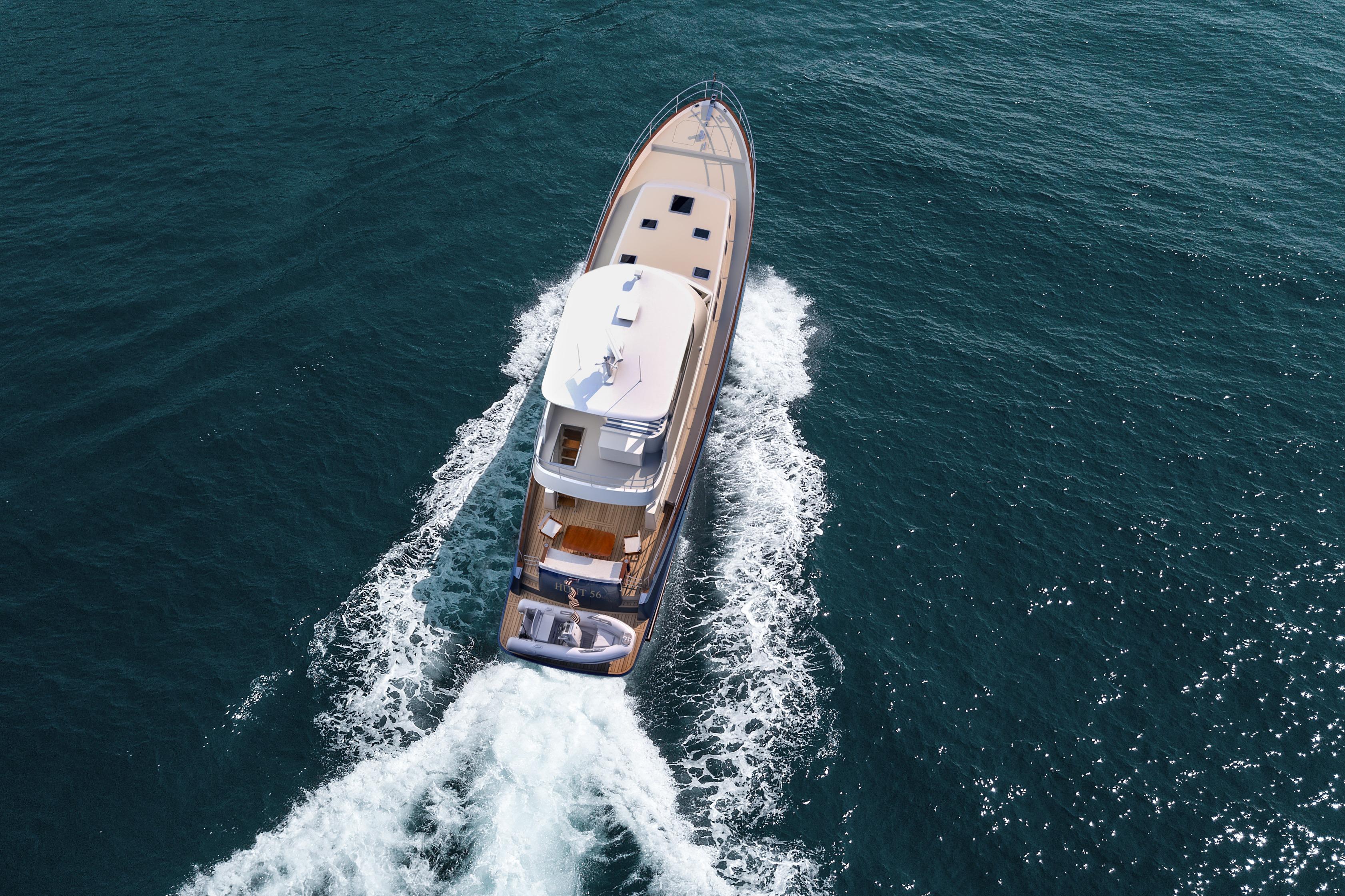 Aerial view of 2027 Hunt Yachts 56 Ocean Flybridge cruising on open water.