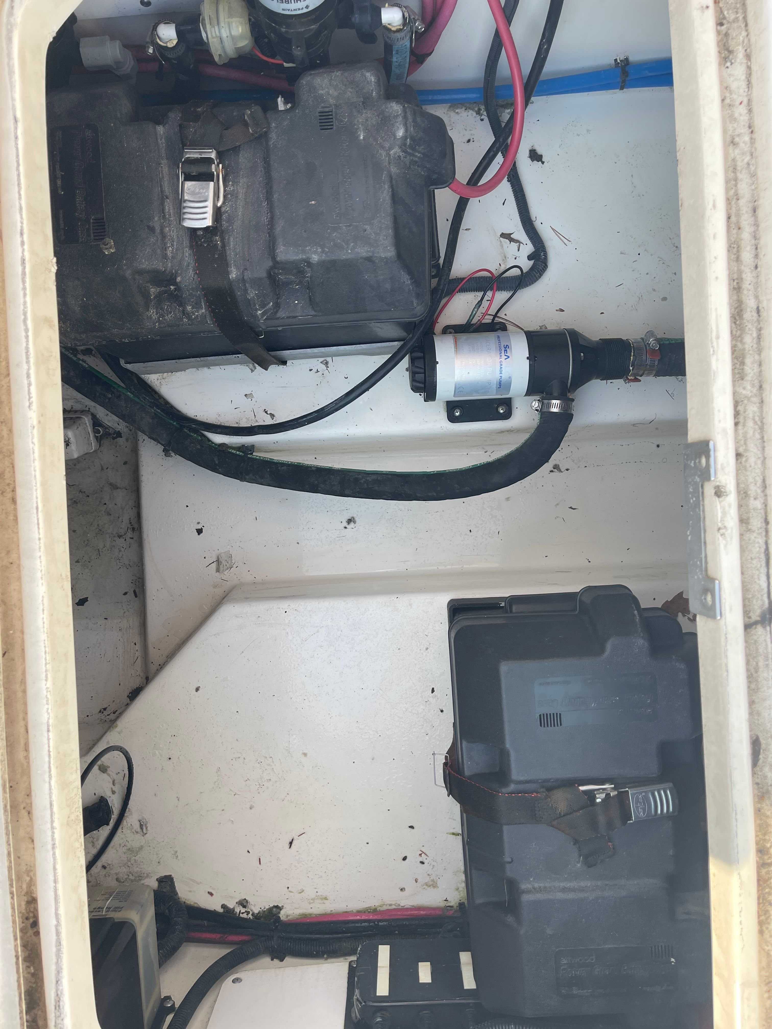 Interior of a 2001 Boston Whaler 26 Conquest boat with batteries.
