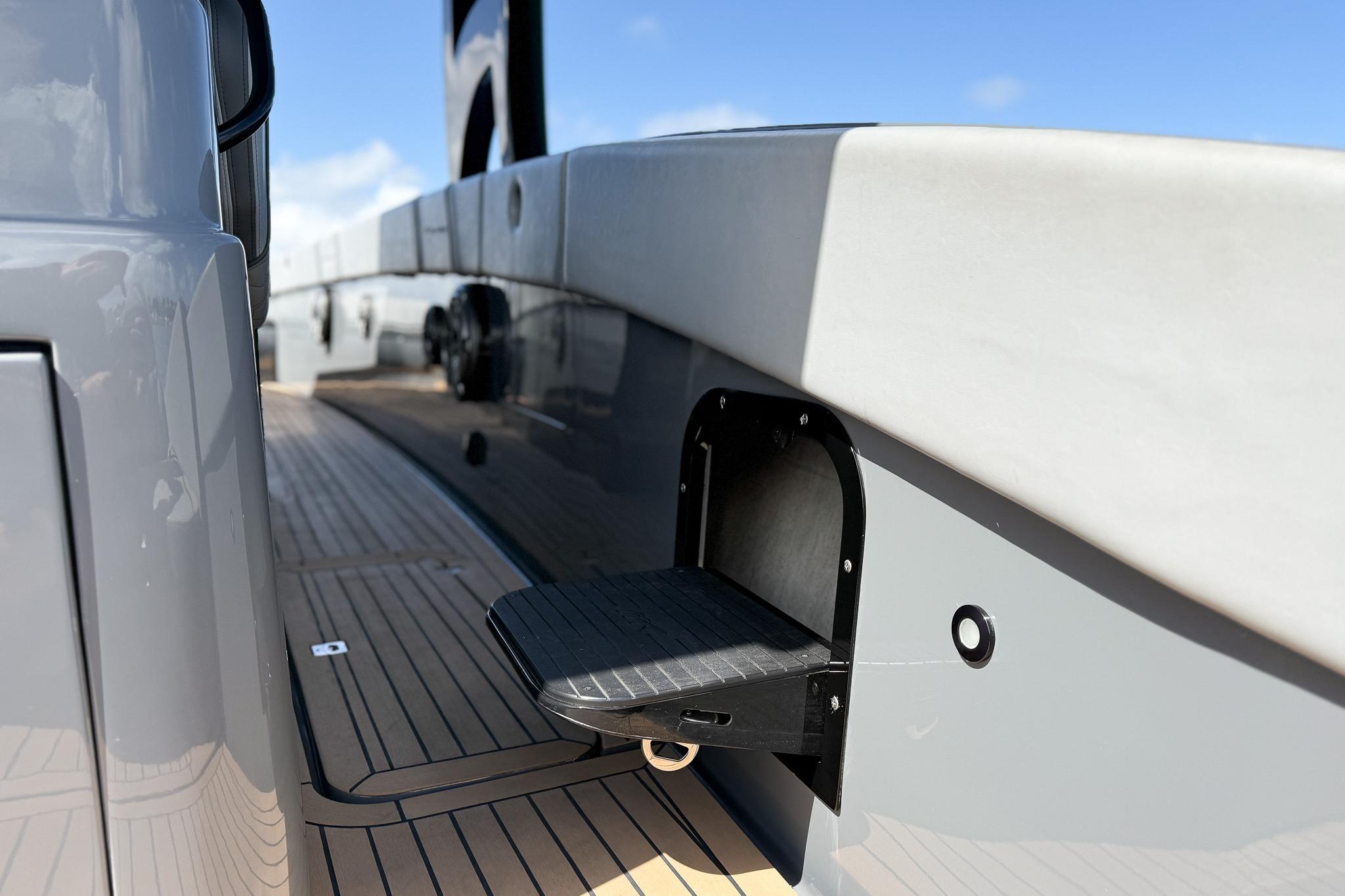 2023 Midnight Express 43 Solstice yacht deck with retractable step feature.