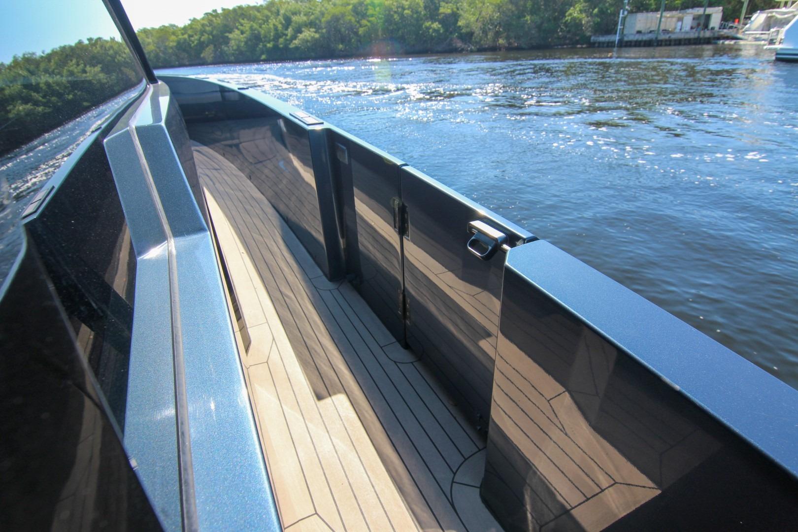 2022 Vanquish Yachts VQ45 deck with sleek design on calm water.