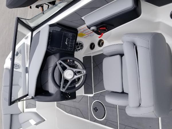 2023 ATX Surf Boats 20 Type-S cockpit with modern steering wheel and comfortable seating.