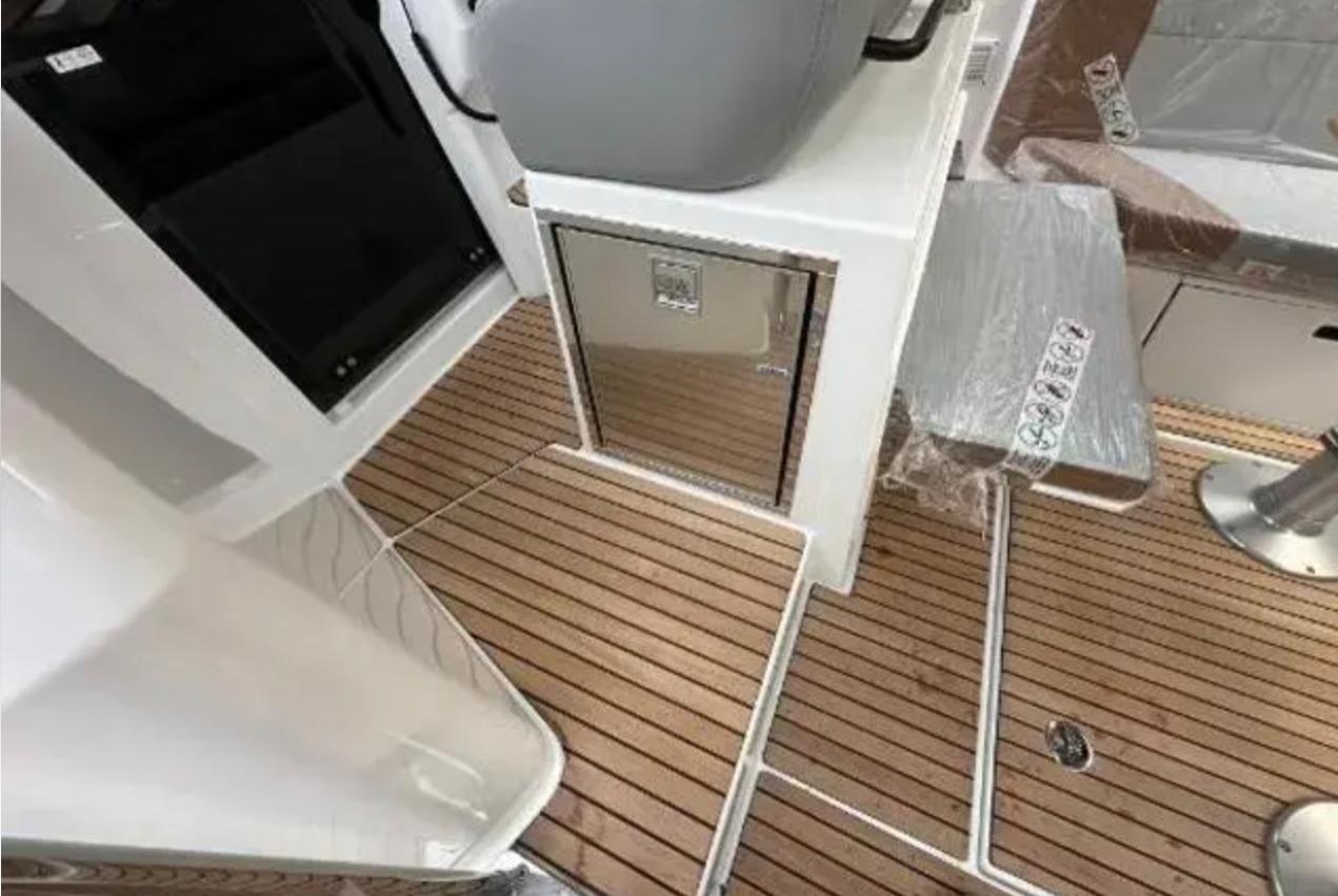 2023 Beneteau Flyer 9 interior with sleek wood flooring and modern design elements.
