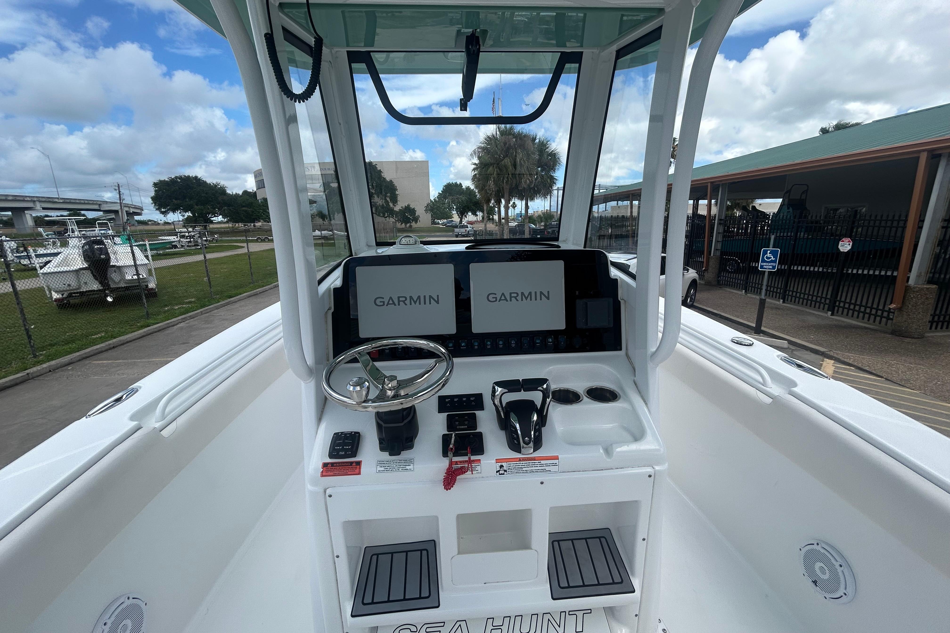 2023 Sea Hunt Gamefish 27 Coffin Box boat dashboard with Garmin navigation system.