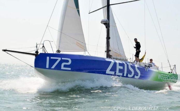 Sailing yacht Class 40 Pogo S4, 2021, with Zeiss branding on the ocean.