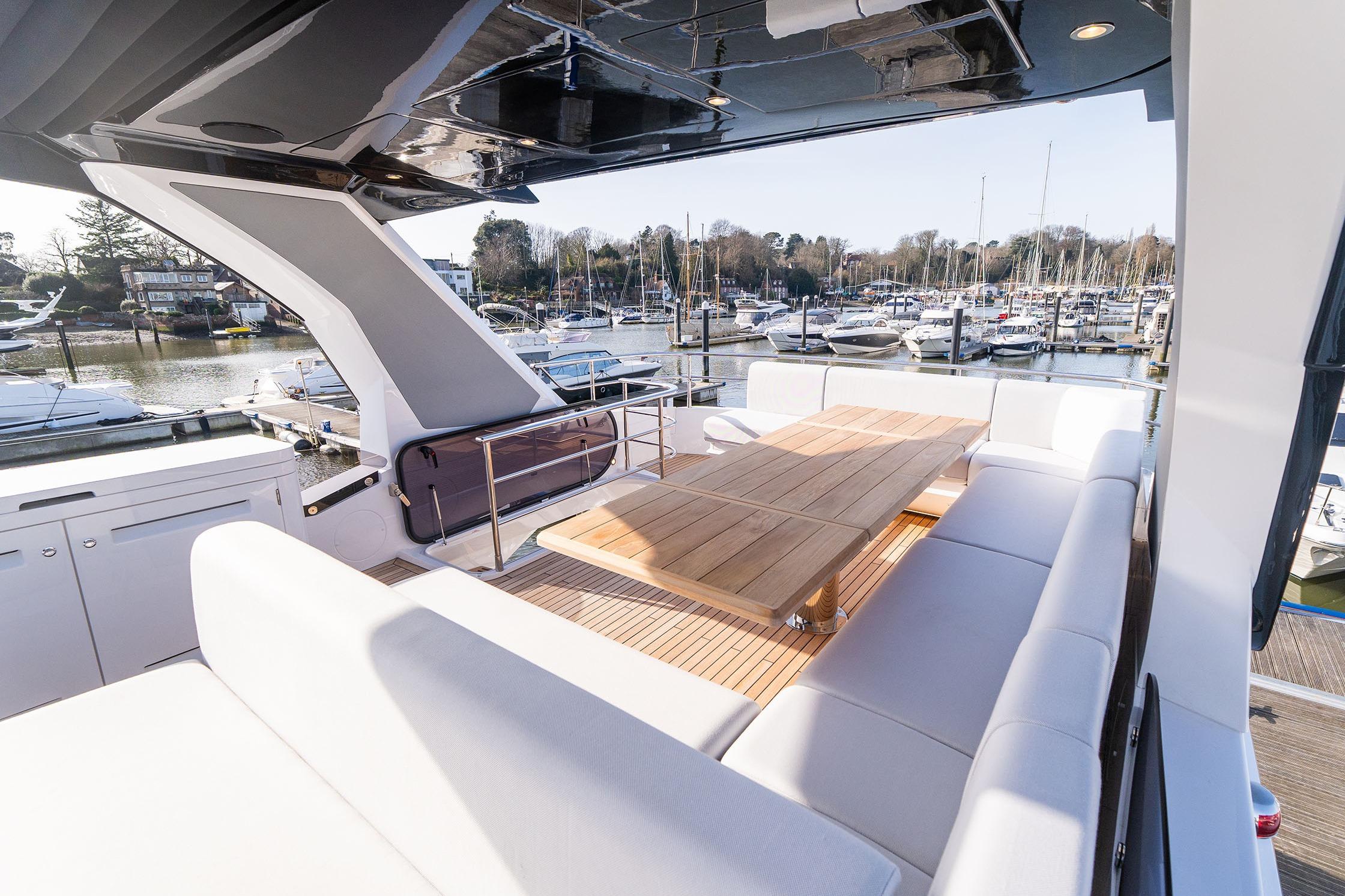 Luxurious Sunseeker Manhattan 68 yacht deck with elegant seating, 2026 model.