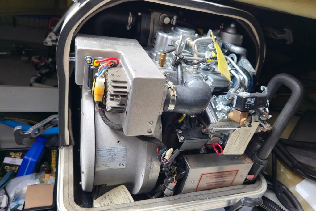 Engine compartment of a 2021 Fountaine Pajot MY4.S motor yacht, showcasing mechanical components.