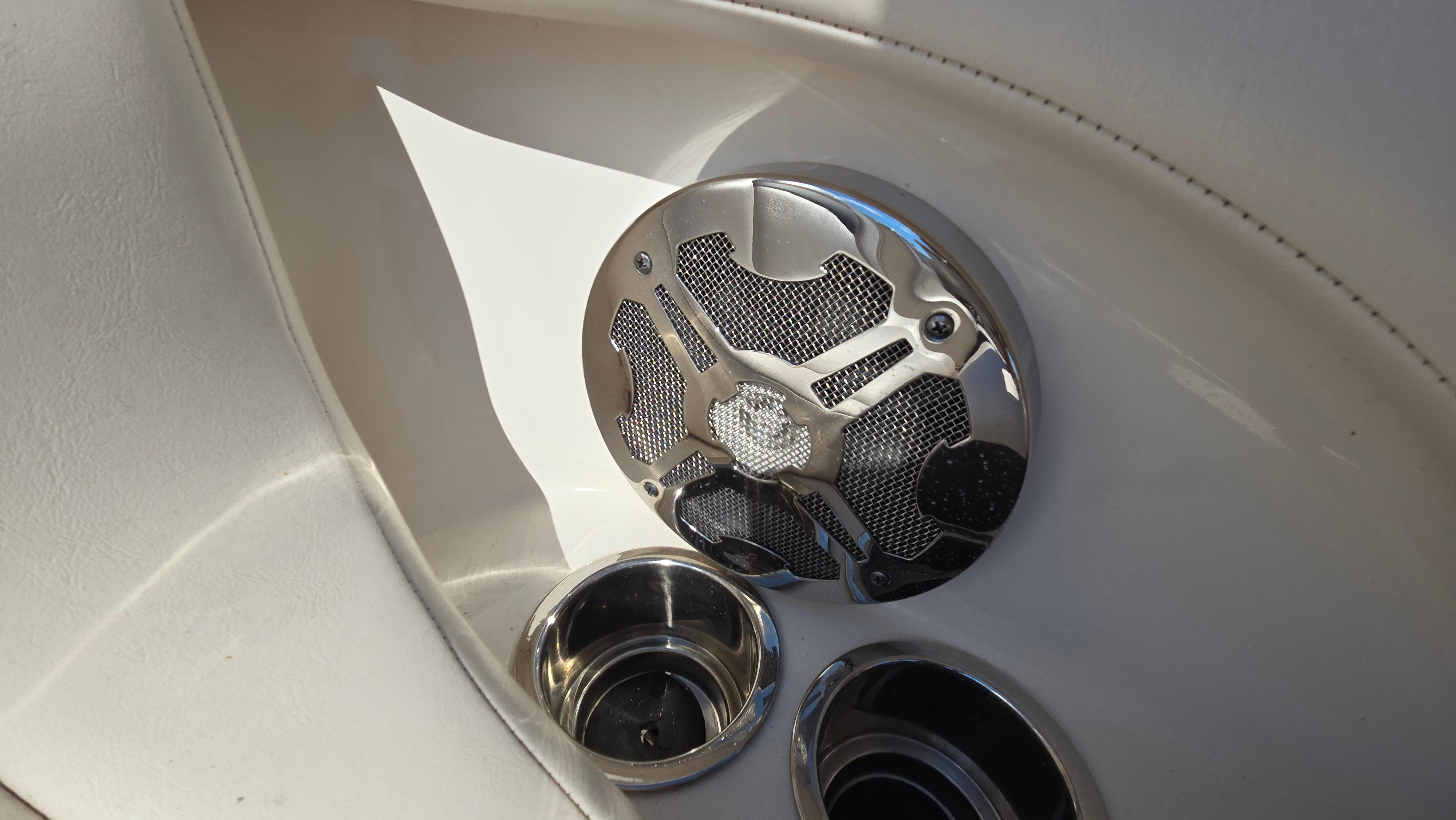 Speaker and cup holders on 2018 Chaparral 224 Sunesta boat interior.