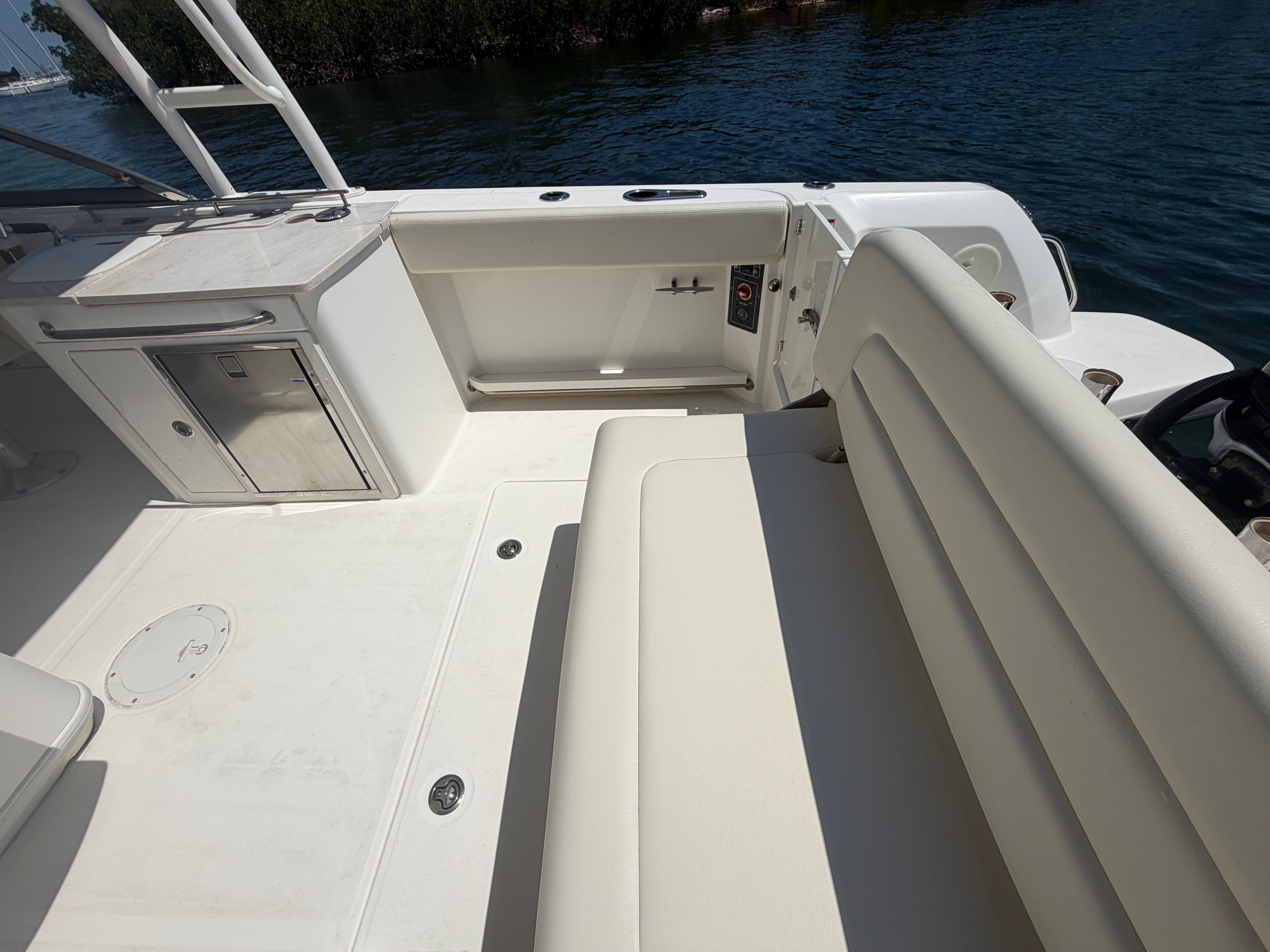 Interior of a 2016 Boston Whaler 270 Vantage boat with seating area.