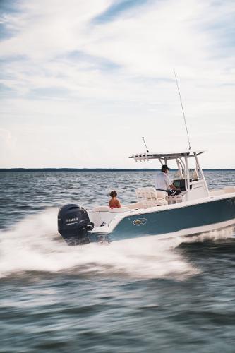 2024 Sea Hunt Ultra 234 boat cruising on open water.