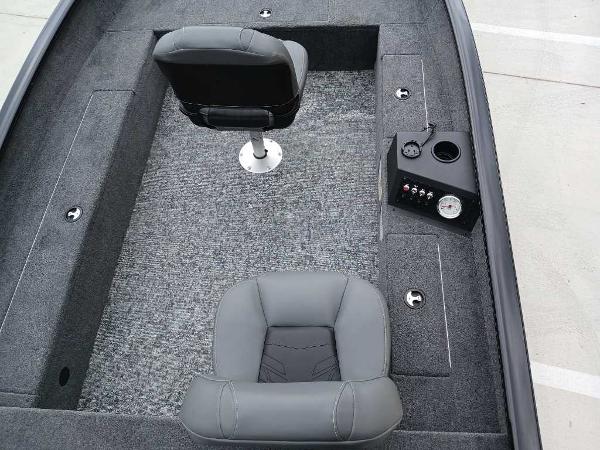 2025 Tracker Super Guide V-16 T boat interior with seating and control panel.