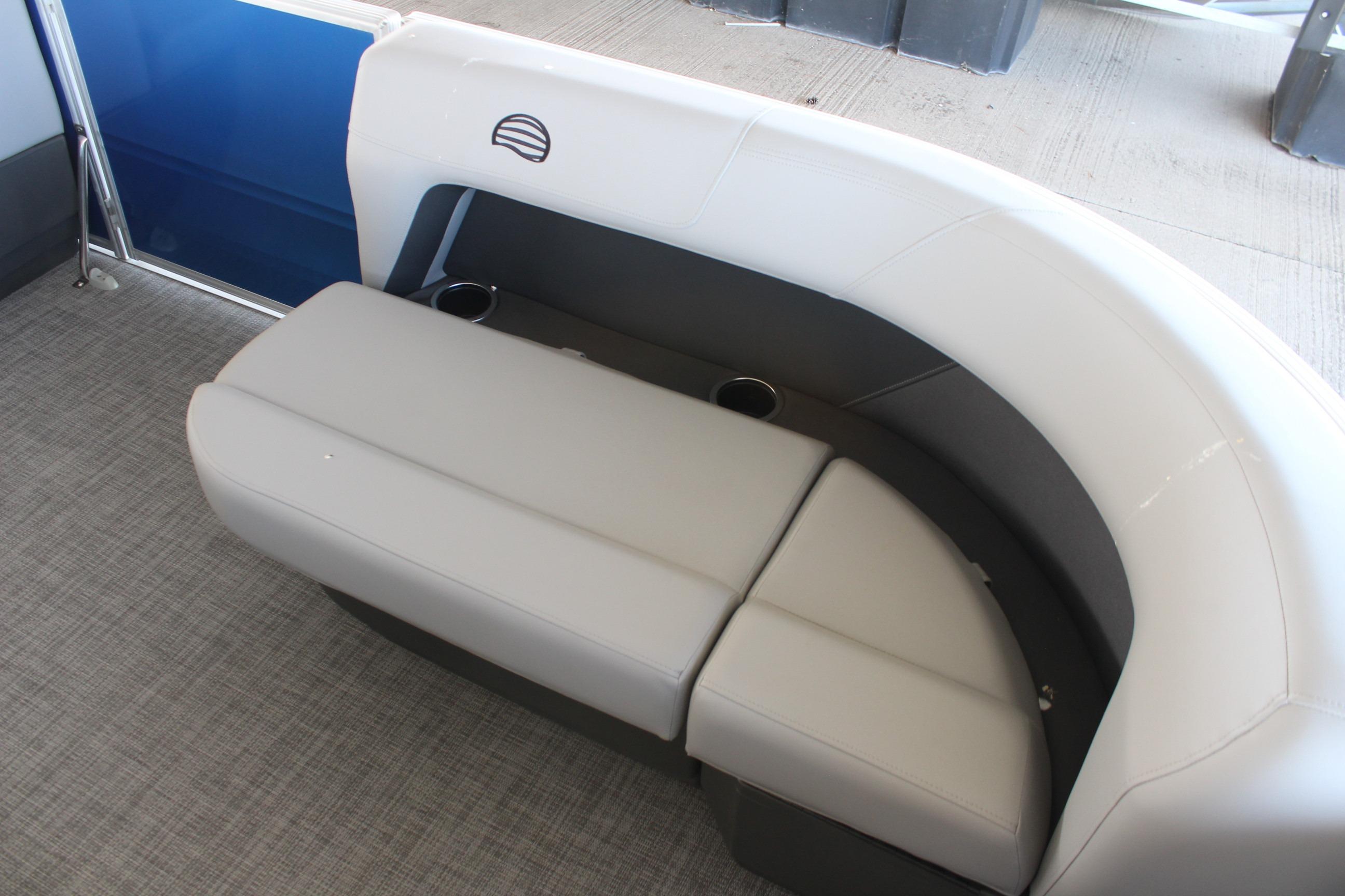 2026 Sun Tracker Party Barge 16 DLX pontoon seating with cup holders.
