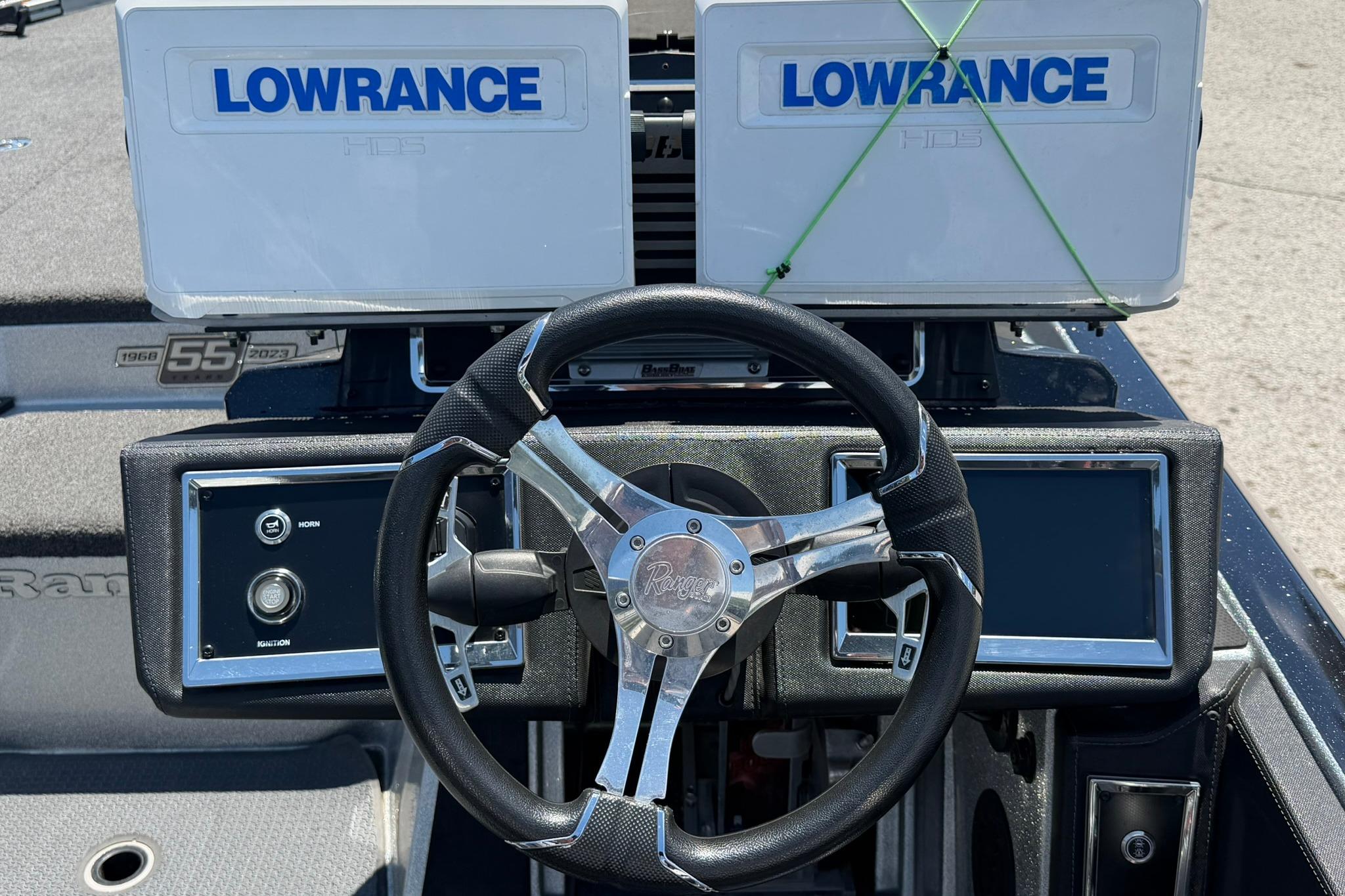 2023 Ranger Z521R boat dashboard with Lowrance displays and steering wheel.
