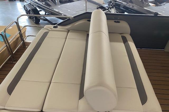 2026 Bentley Pontoons Legacy 223 Swingback with luxurious beige seating and sleek design.