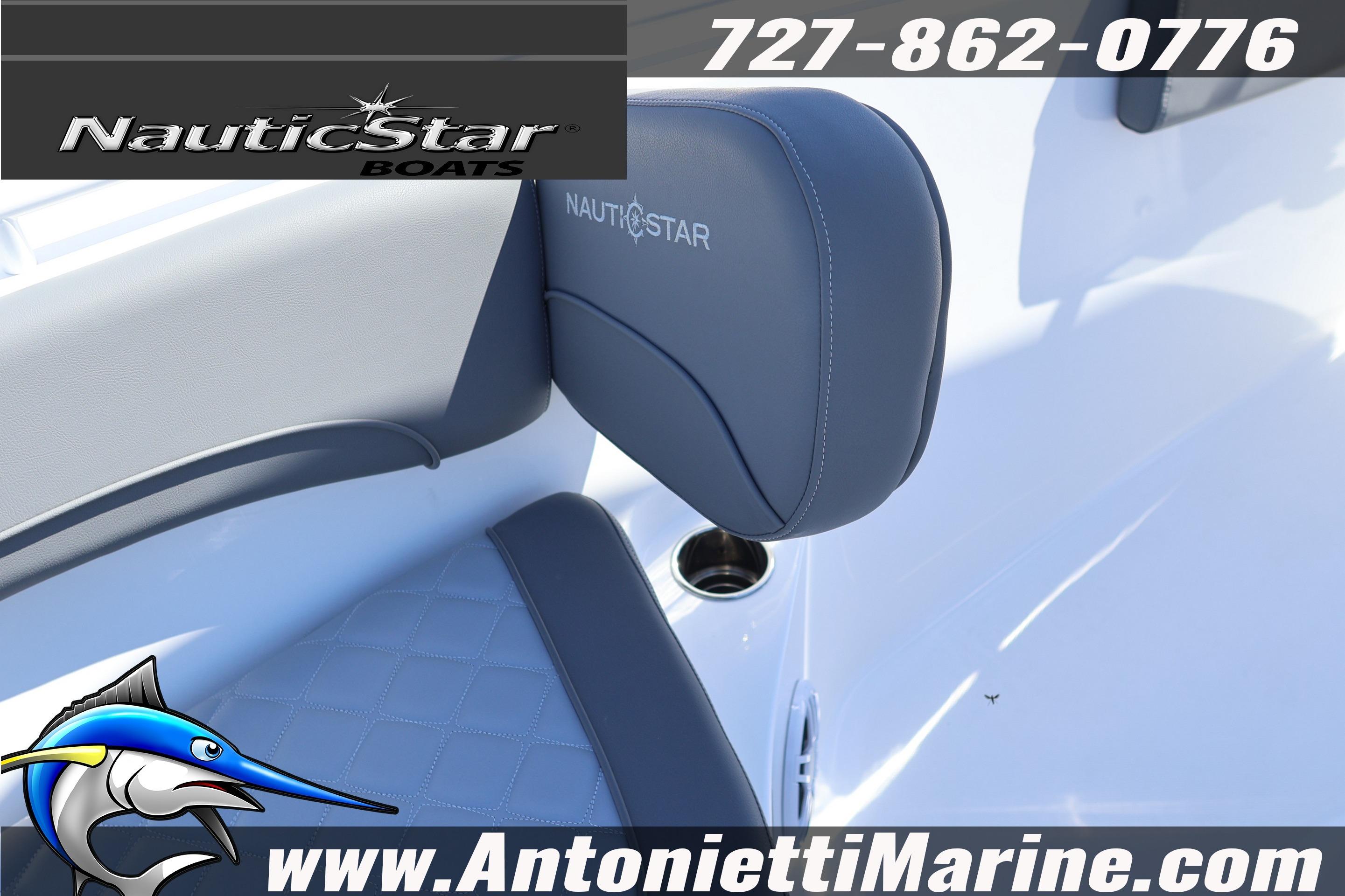 2026 NauticStar 292 Legacy boat seat detail with logo and contact information.