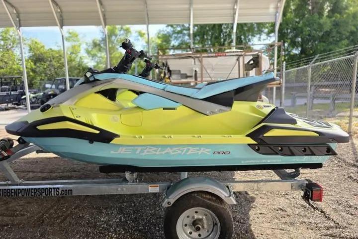 2025 Yamaha WaveRunner JetBlaster PRO 3-Up on trailer, vibrant yellow and blue design.
