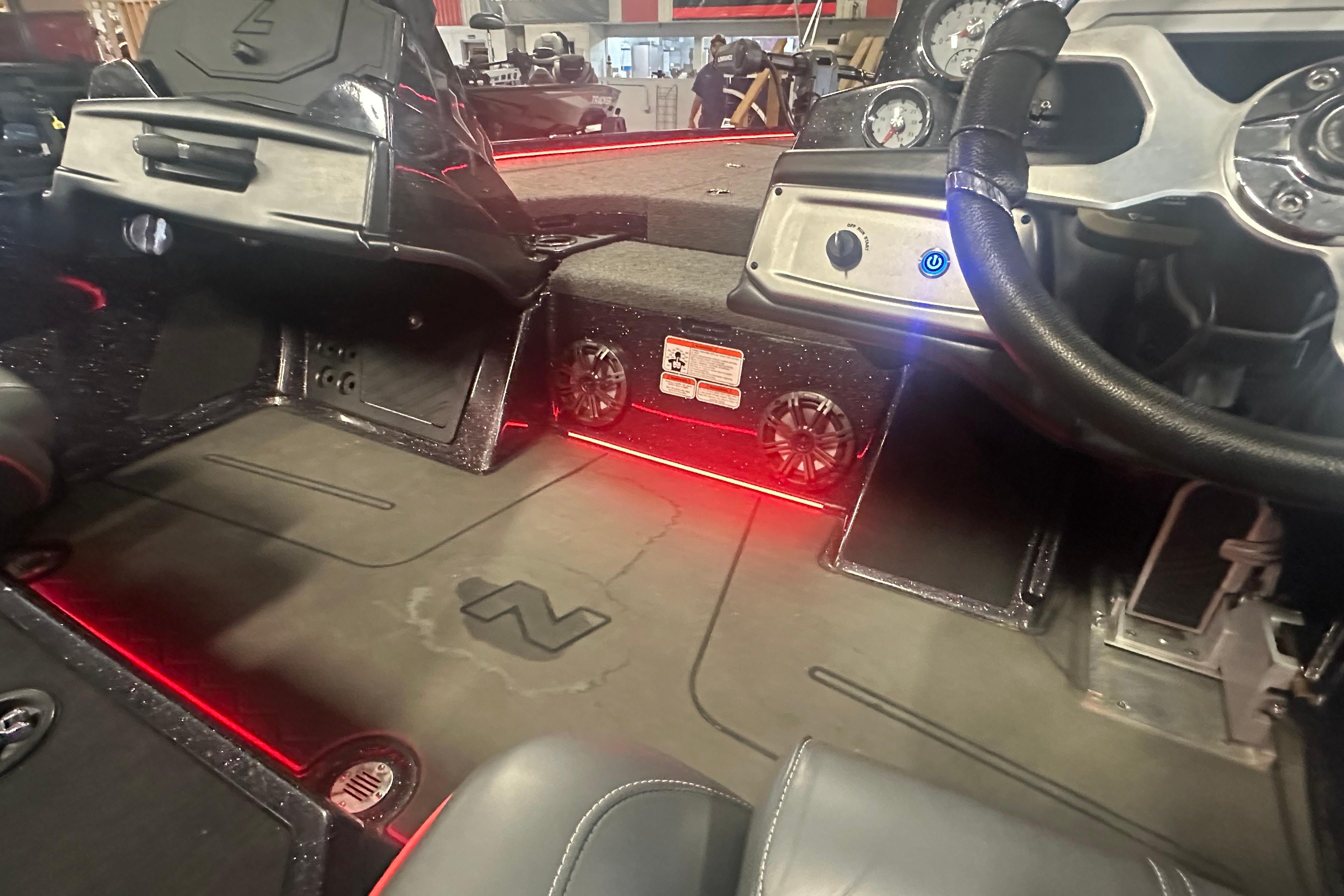 Interior of 2022 Nitro Z20 Pro boat with red LED lighting and modern dashboard.