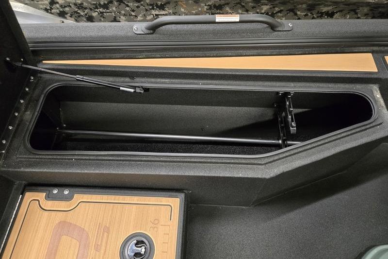 Storage compartment of Avid 207 Recon 2026 boat, featuring sleek design and durable materials.