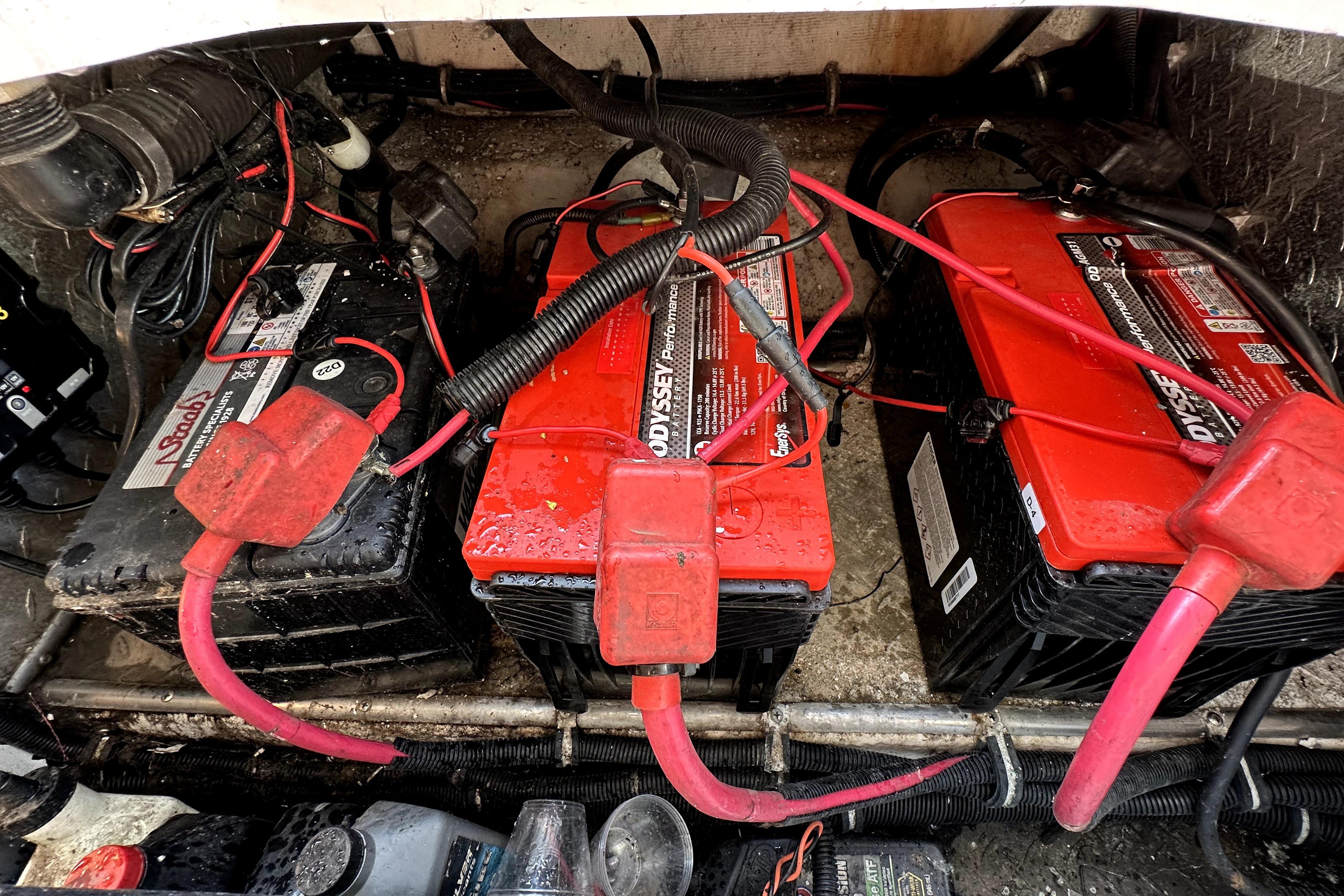 Batteries in a 2003 Donzi 39 ZSC boat engine compartment.