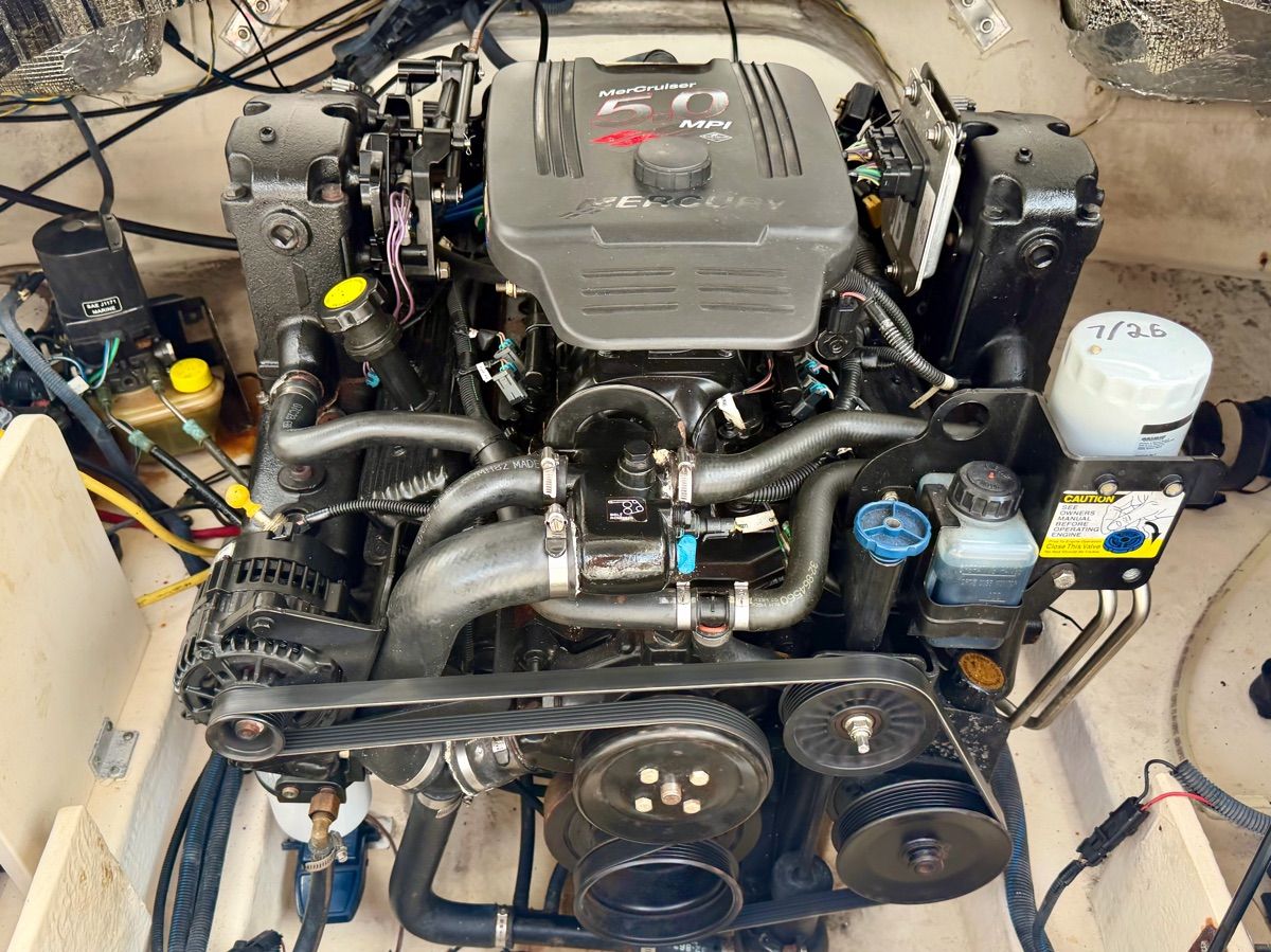 Engine compartment of a 2007 Chaparral 235 SSi with a MerCruiser 5.0 MPI engine.