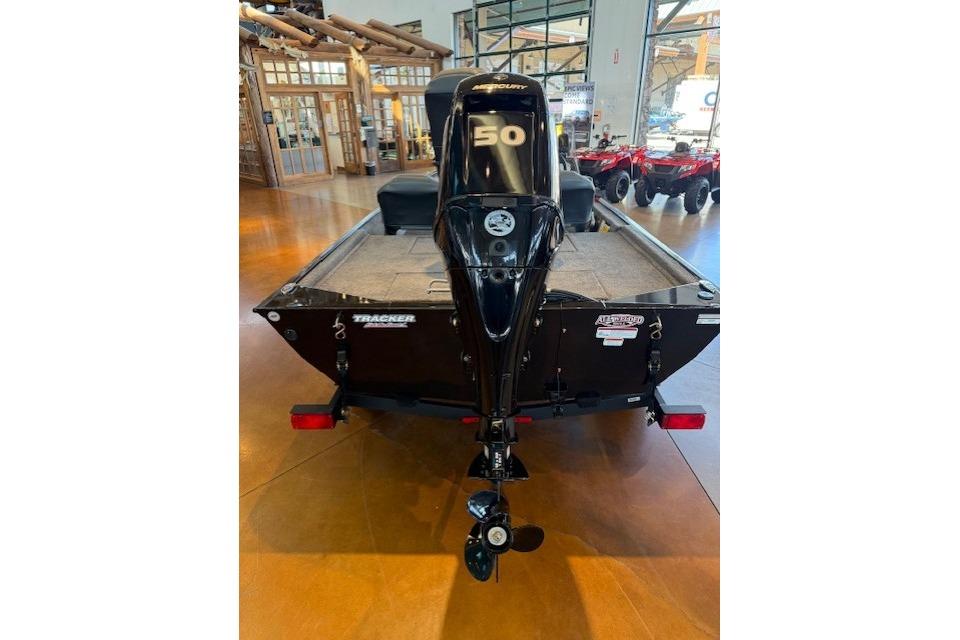 2026 Tracker Bass Tracker Classic XL boat with Mercury 50 engine in showroom.