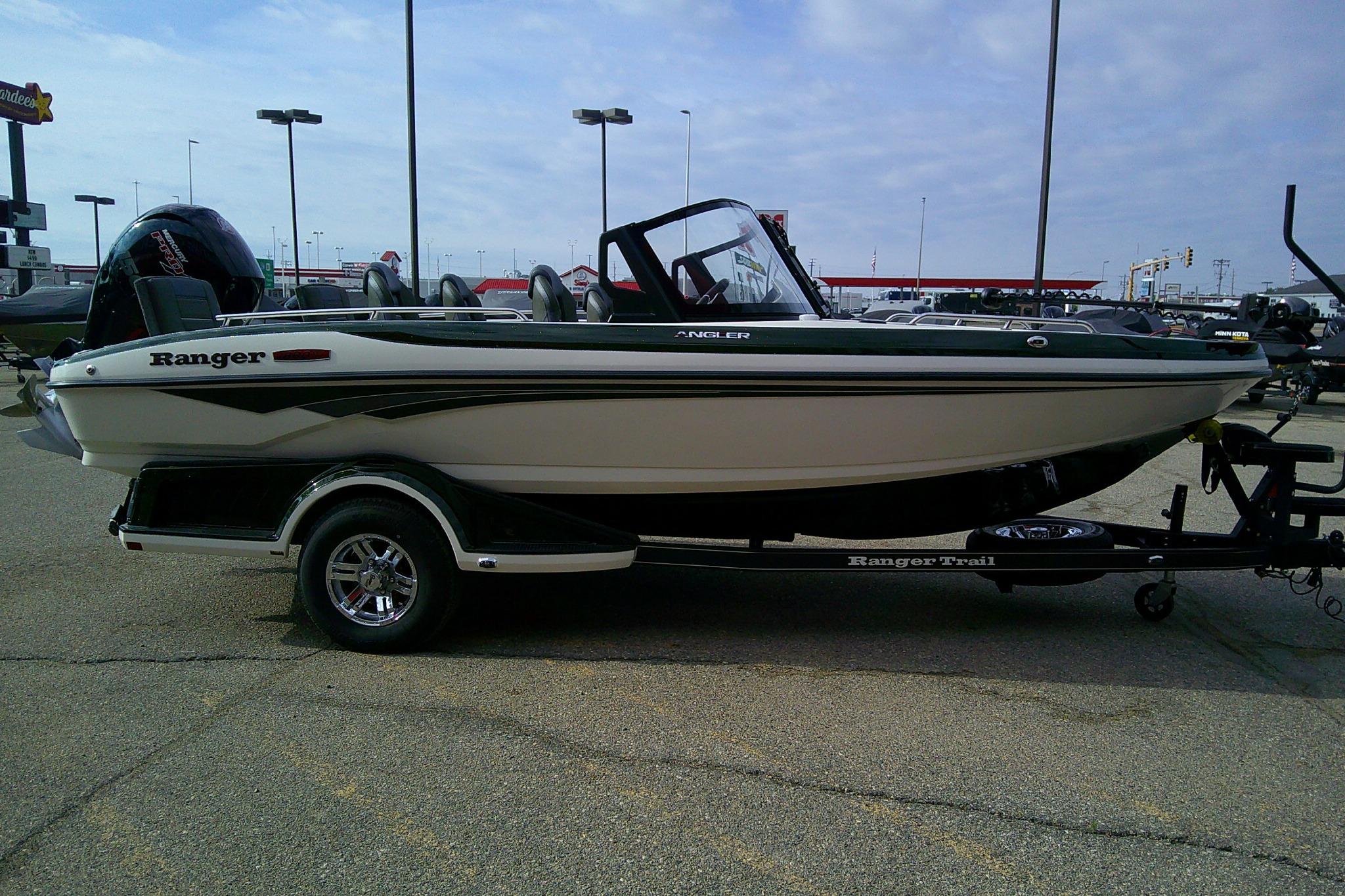 2026 Ranger 1880MS boat on trailer in parking lot, side view.