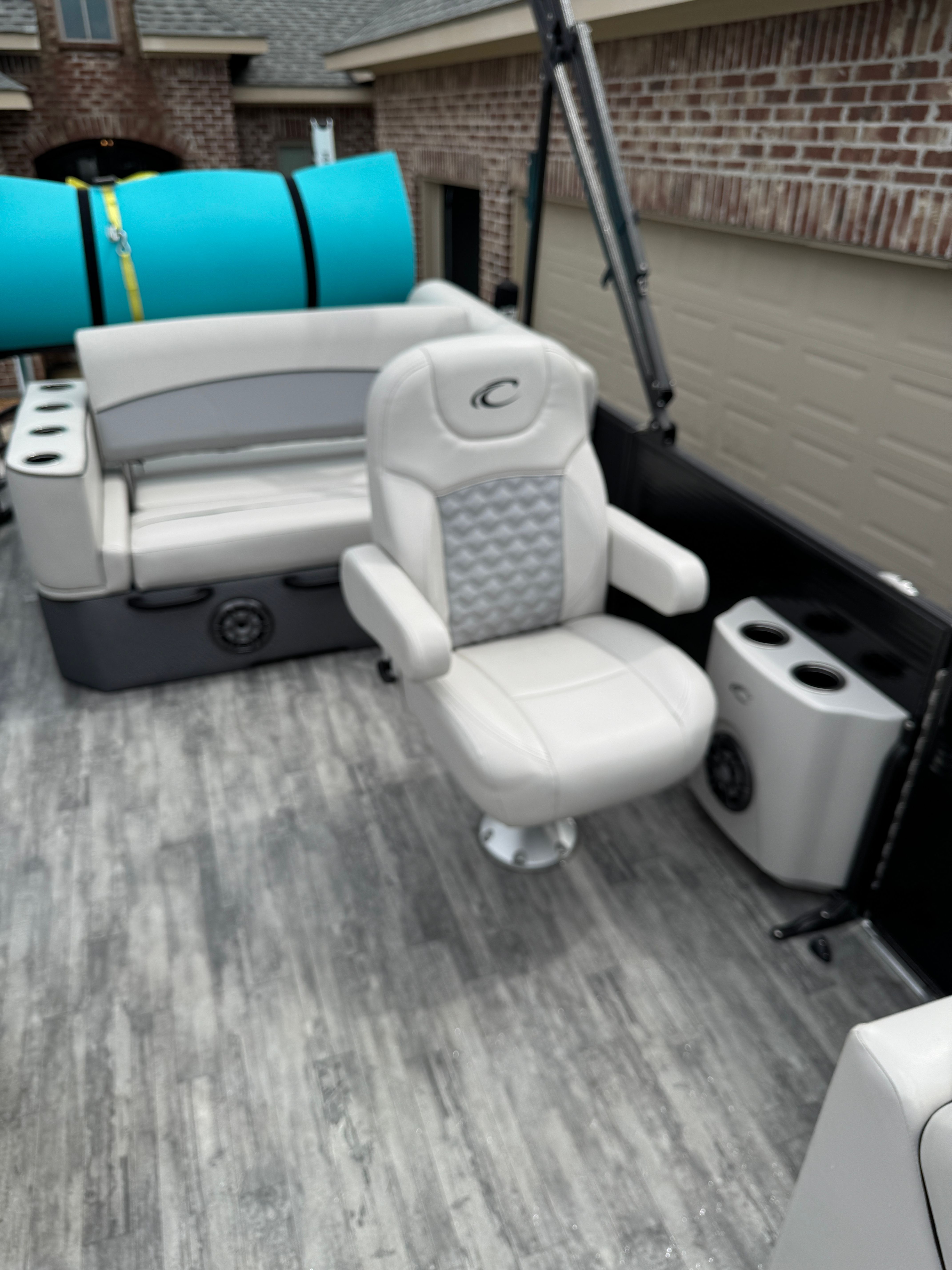 Interior of a 2022 Crest Classic DLX 220 boat with seating.