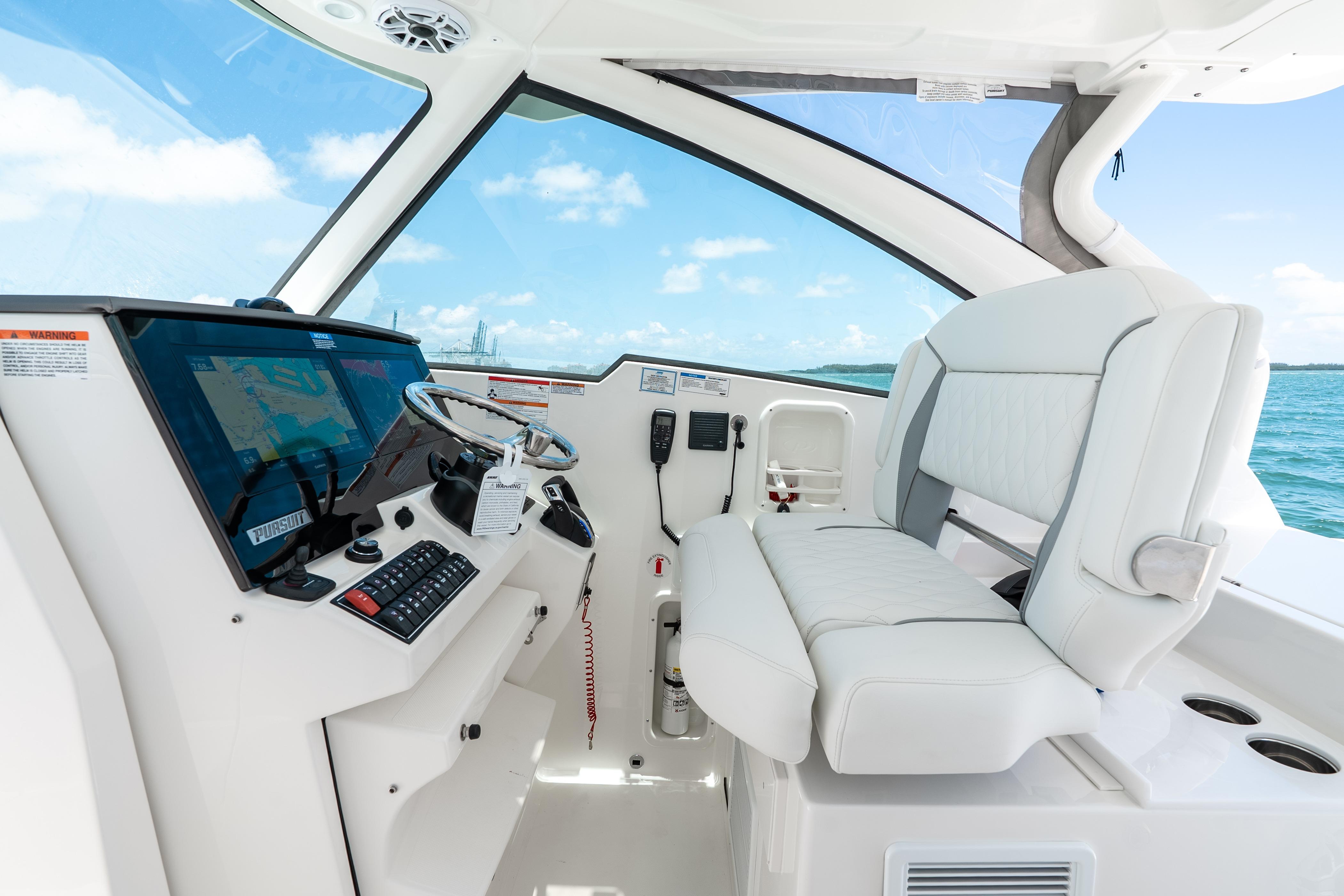 2026 Pursuit DC 326 Dual Console interior with modern helm and seating.
