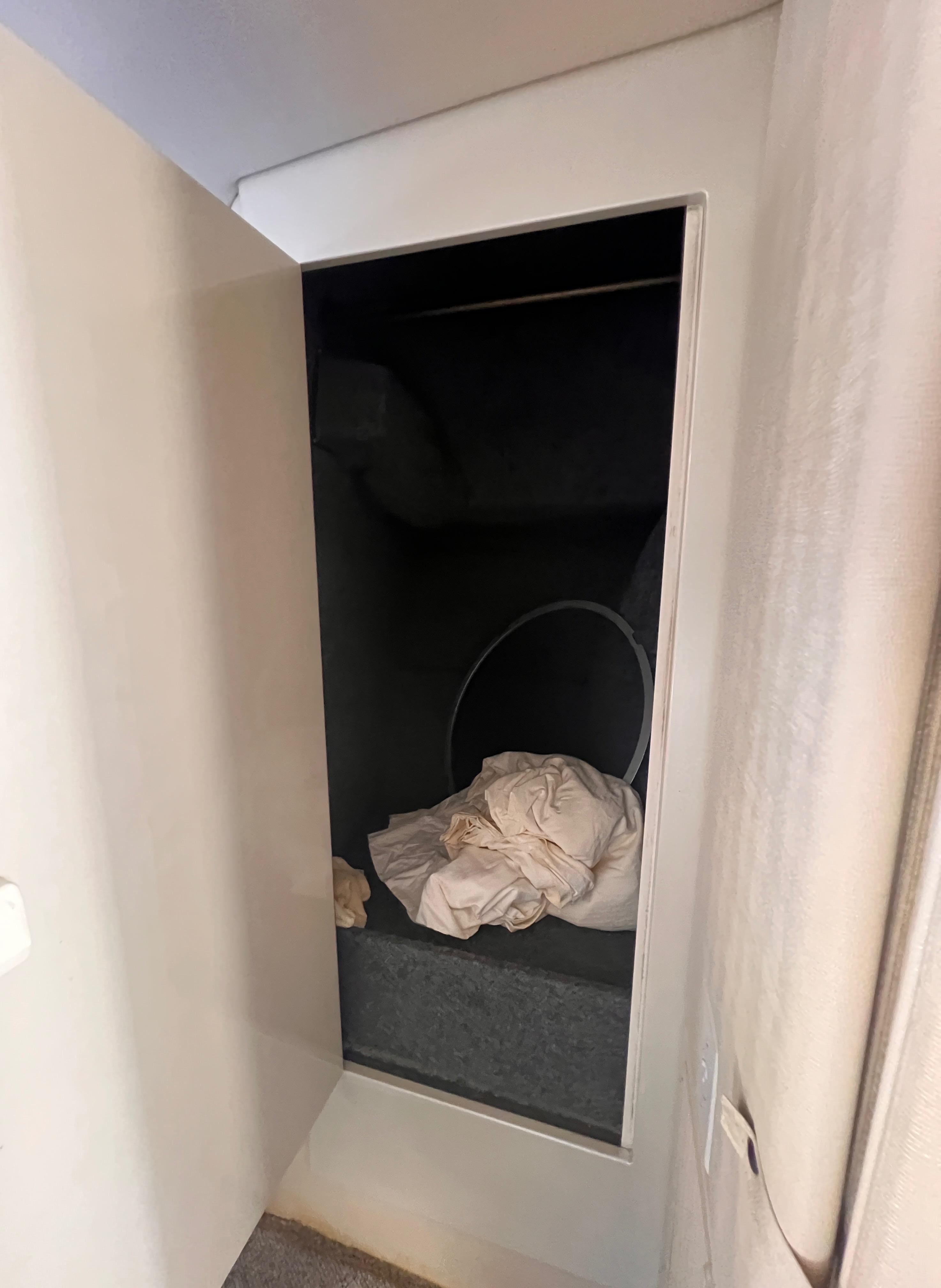 Open storage compartment in 2000 Wellcraft 45 Excalibur boat interior.