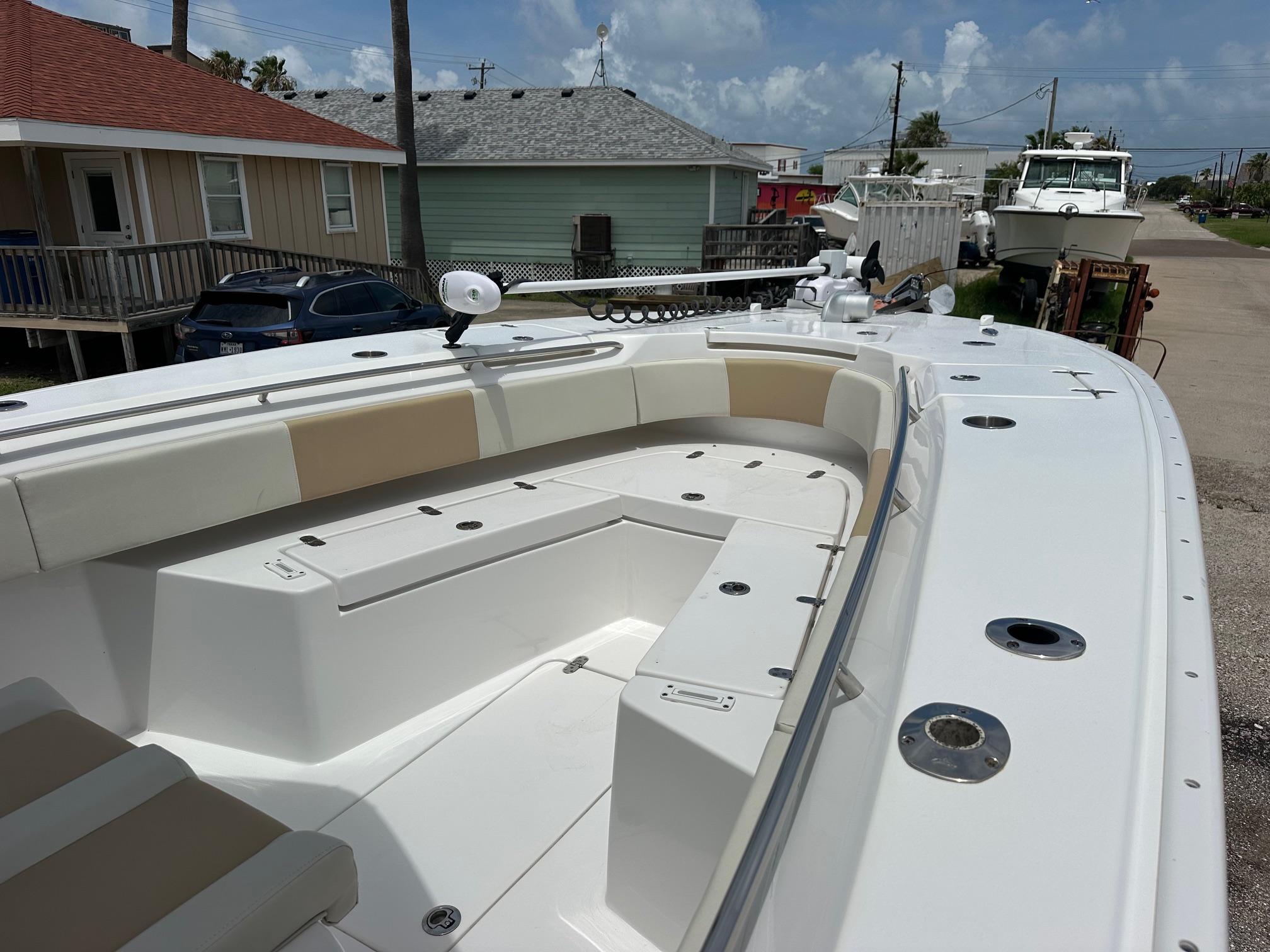 2023 Cape Horn 32xs boat with spacious seating and modern design in a coastal setting.