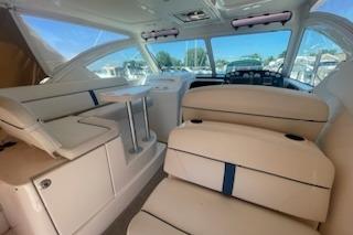 Interior of 2013 Tiara Yachts 3100 Open, featuring luxurious seating and modern design.