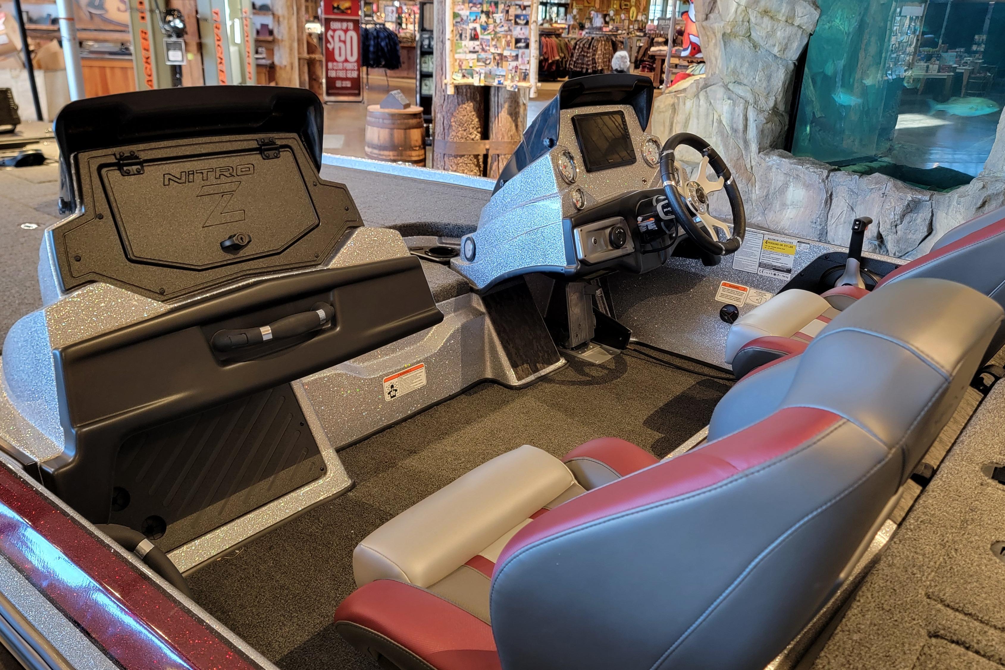 Interior of 2025 Nitro Z20 XL Pro boat with steering console and seating.