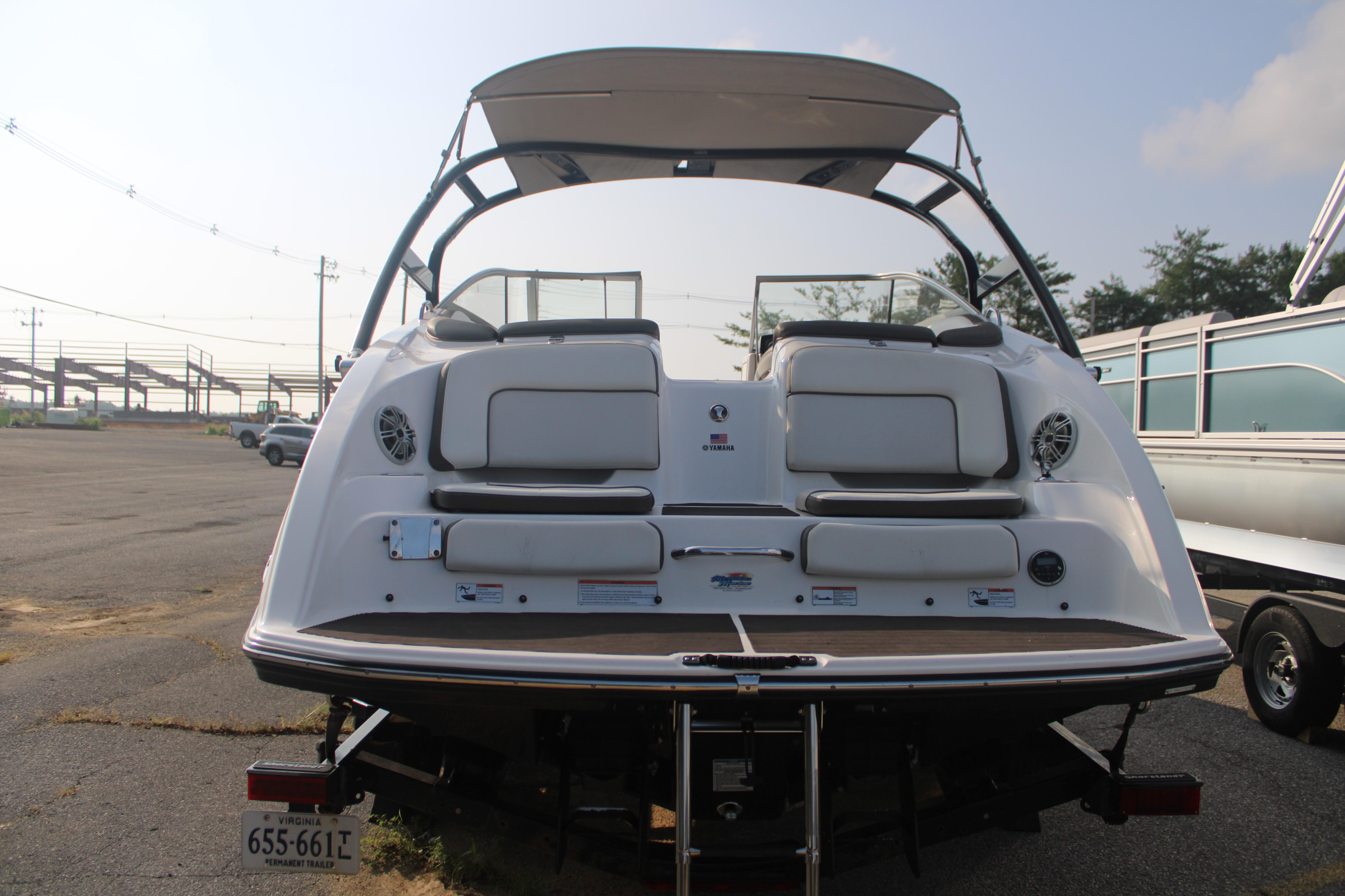 2013 Yamaha Boats 242 Limited S, rear view, showcasing seating and swim platform.