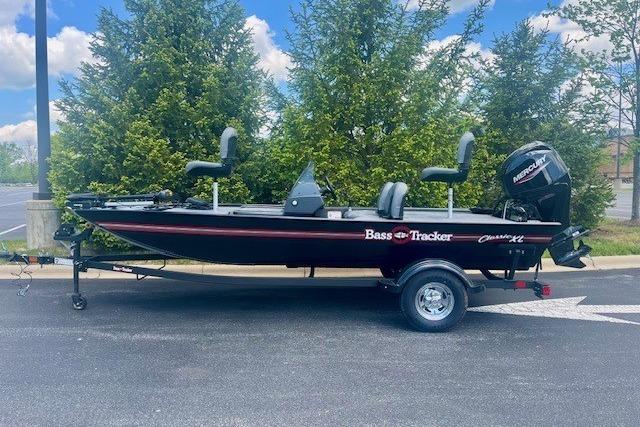 2026 Tracker Bass Tracker Classic XL boat on trailer, parked outdoors.