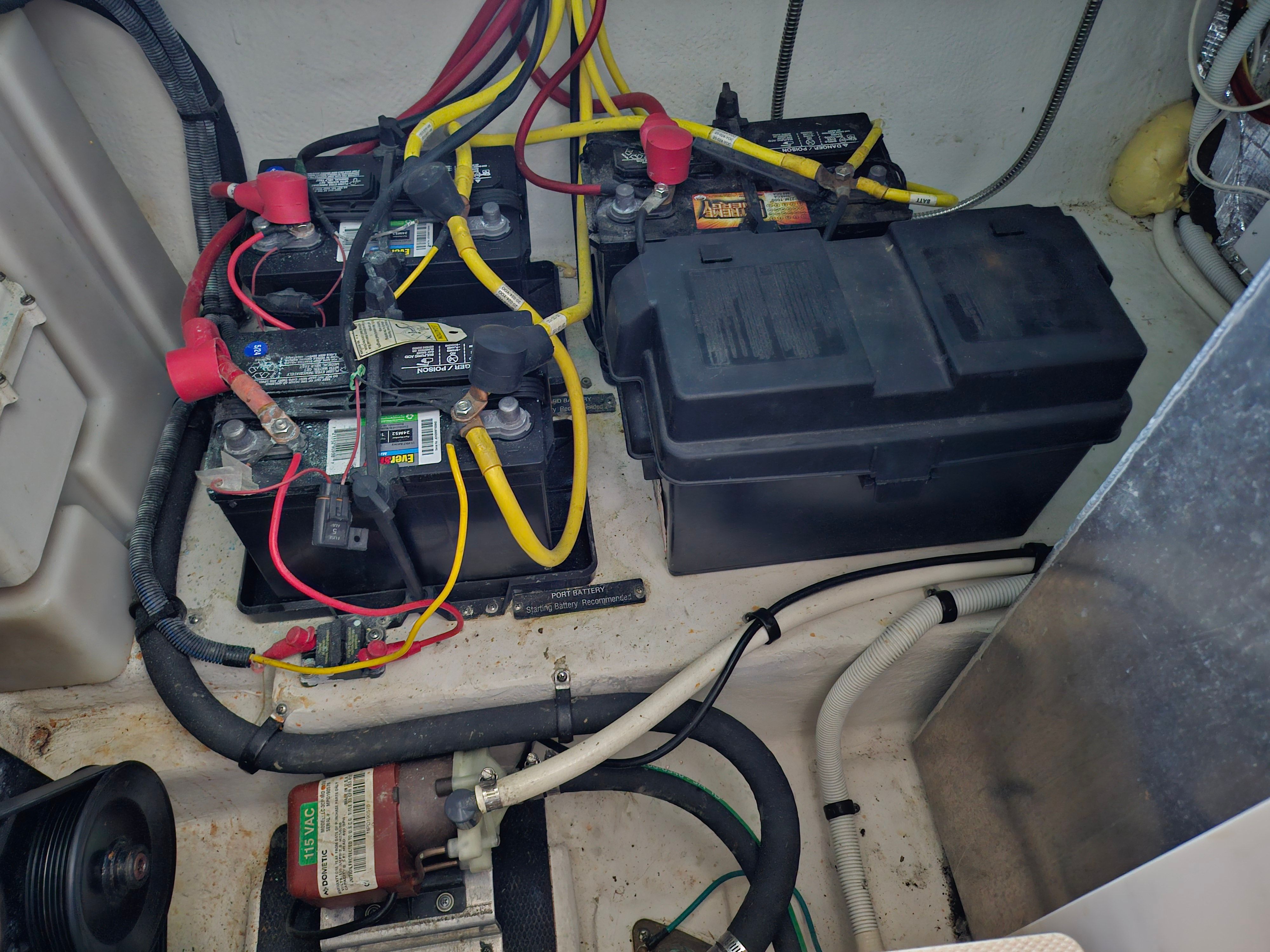 Battery compartment of a 2014 Chaparral 330 Signature boat.