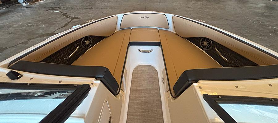 2025 Sea Ray SPX 190 Outboard boat interior with tan seating and sleek design.