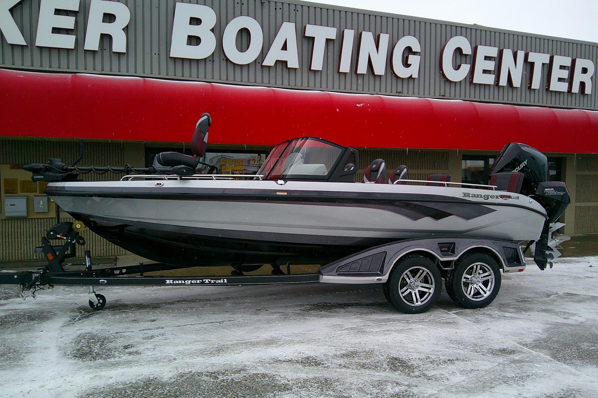 2026 Ranger 620xFS Pro boat on trailer outside dealership in snowy weather.