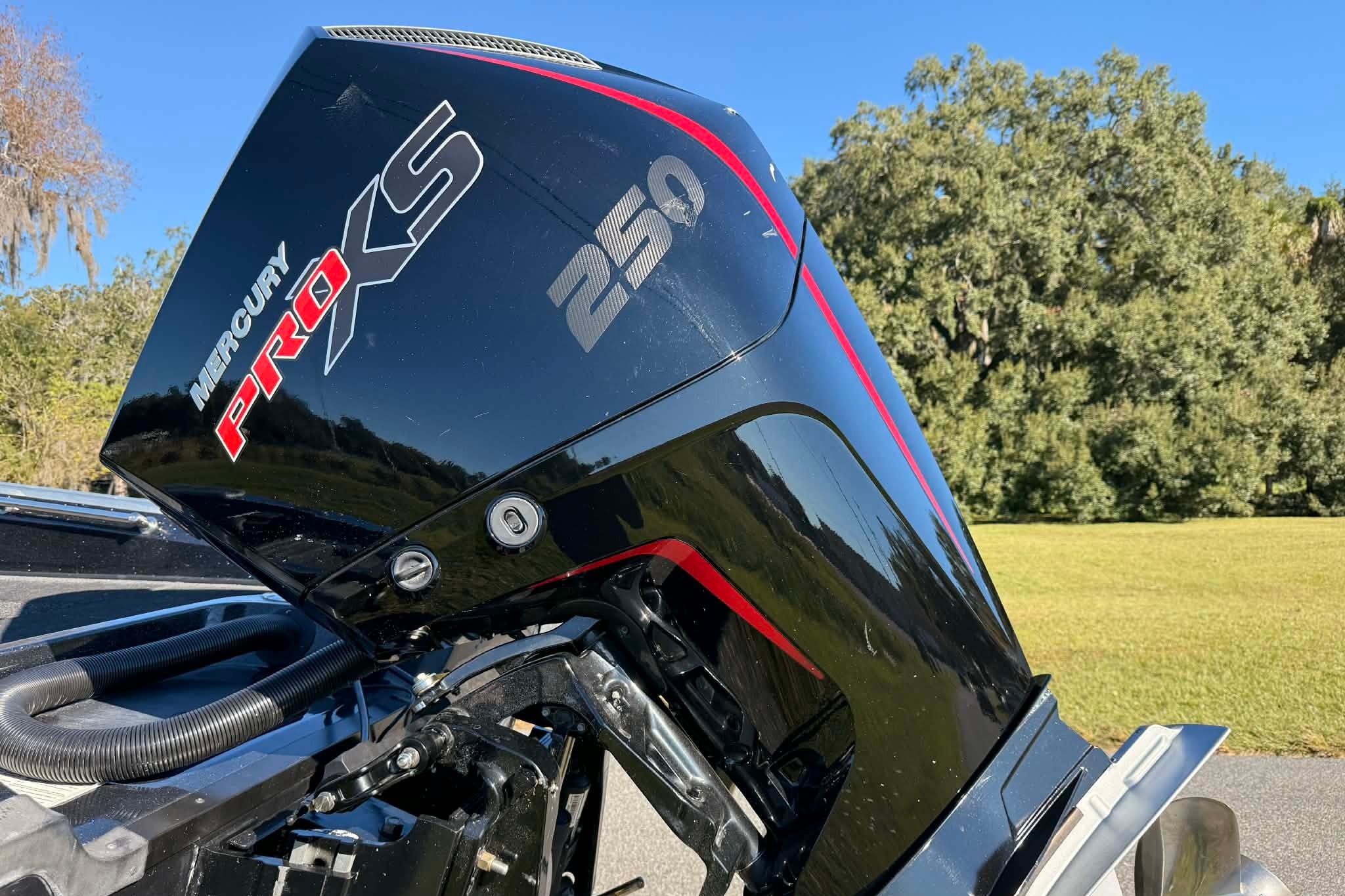 2024 Nitro ZV21 with Mercury Pro XS 250 outboard engine in a scenic outdoor setting.