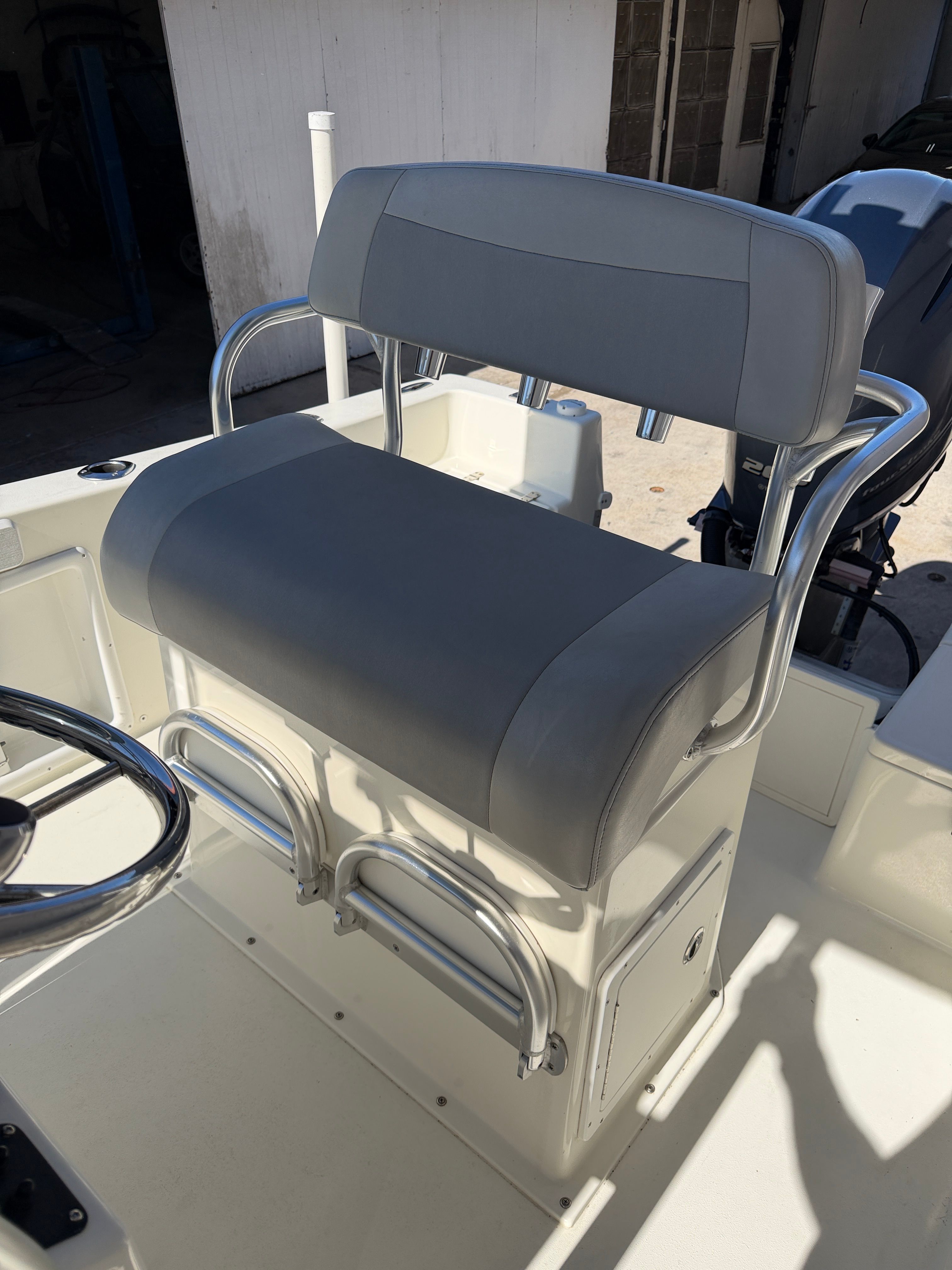 2021 KenCraft Challenger boat seat with gray upholstery.