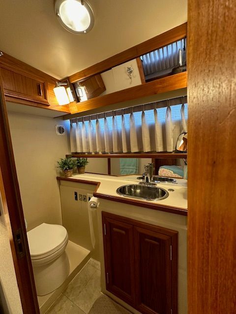 Interior view of Carver 3807 yacht bathroom, 1988 model.