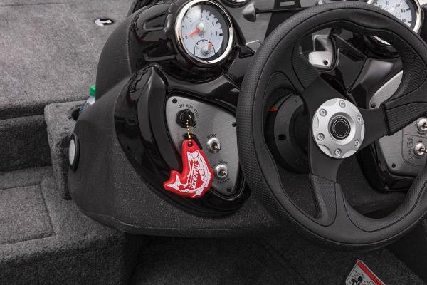 Close-up of a 2021 Tracker Pro Team 175 TXW helm with steering wheel and gauges.