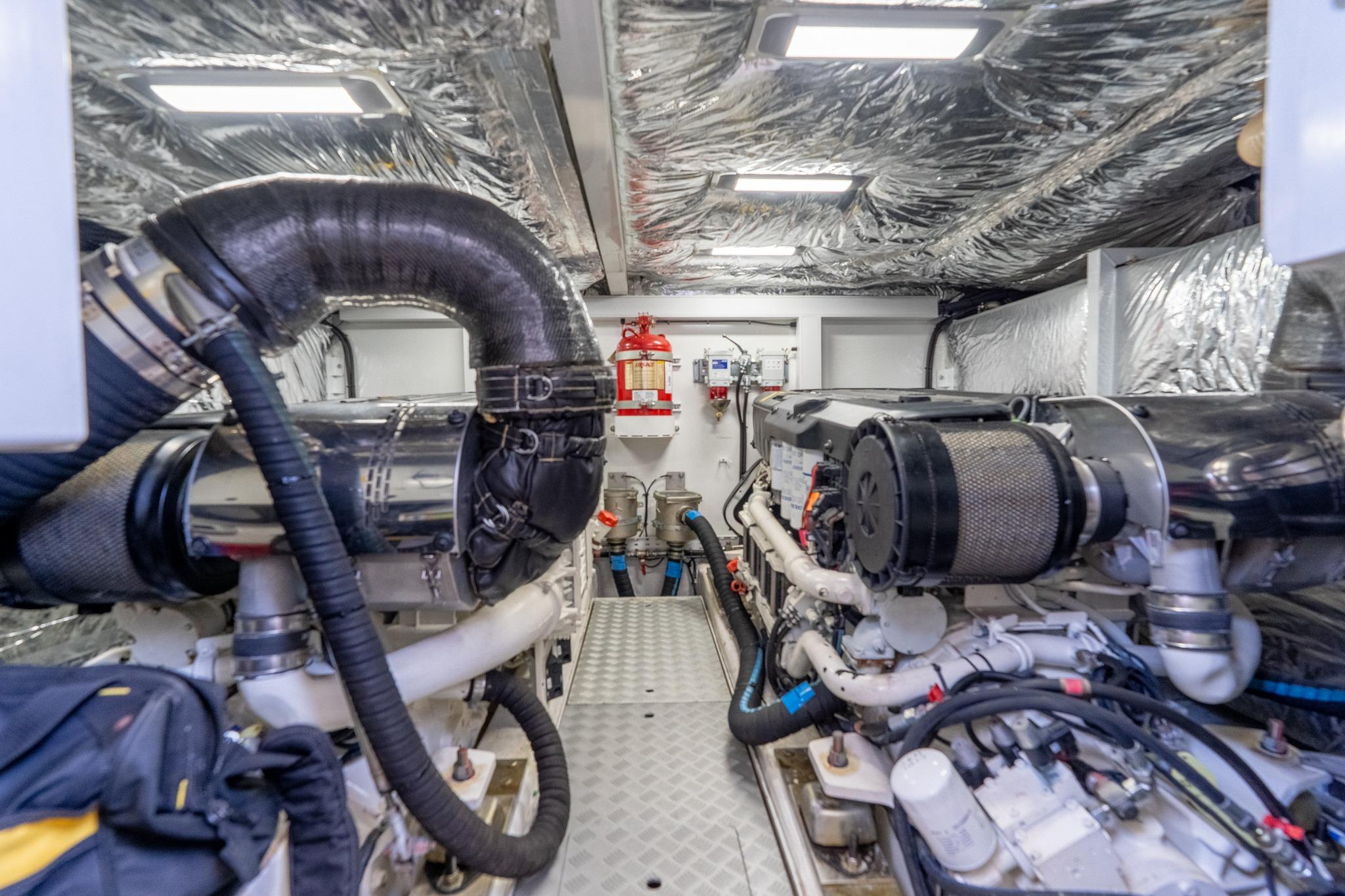 Engine room of a 2021 Princess F55 yacht, featuring advanced machinery and insulation.
