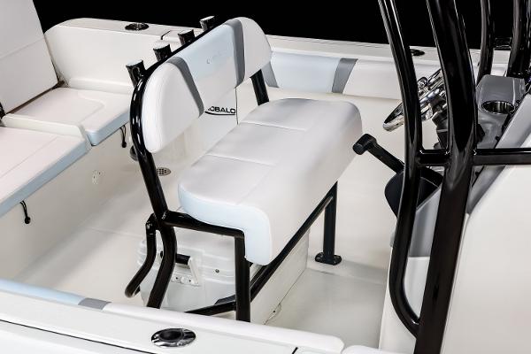 Manufacturer Provided Image: 2025 Robalo R232 Explorer boat interior with white seating and black frame.
